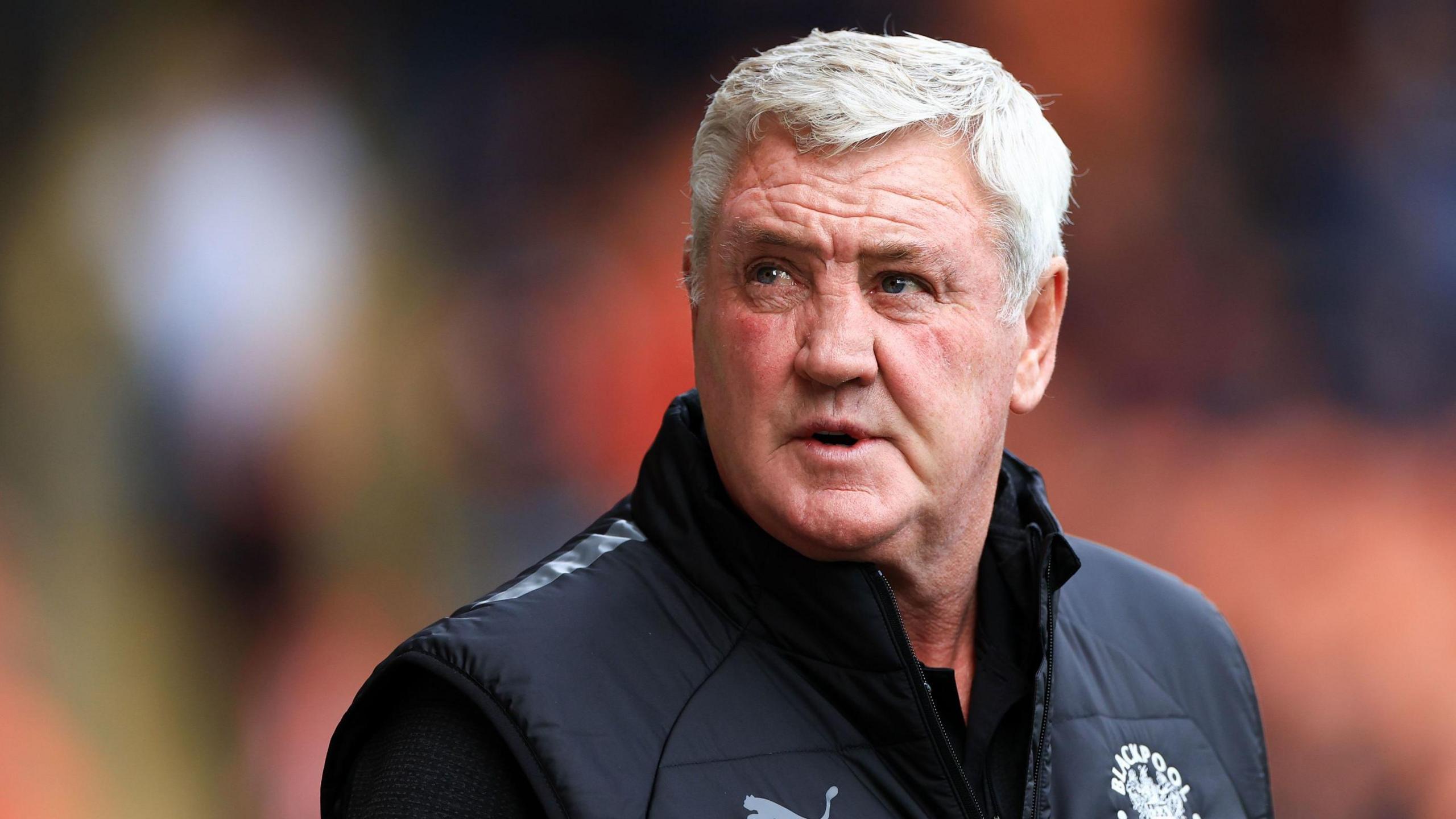 Blackpool boss Steve Bruce looks on