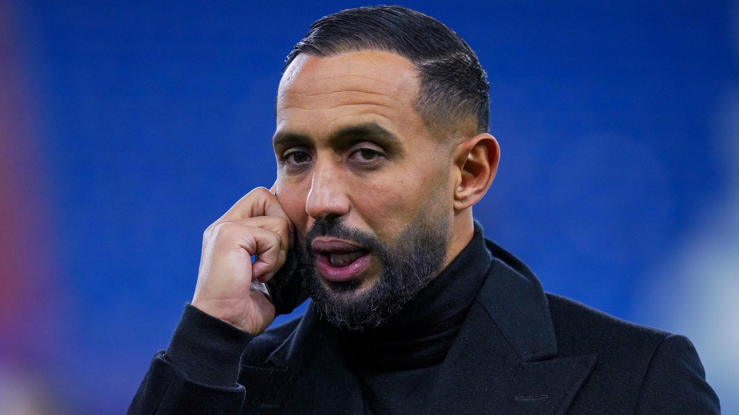 Medhi Benatia speaking on the phone