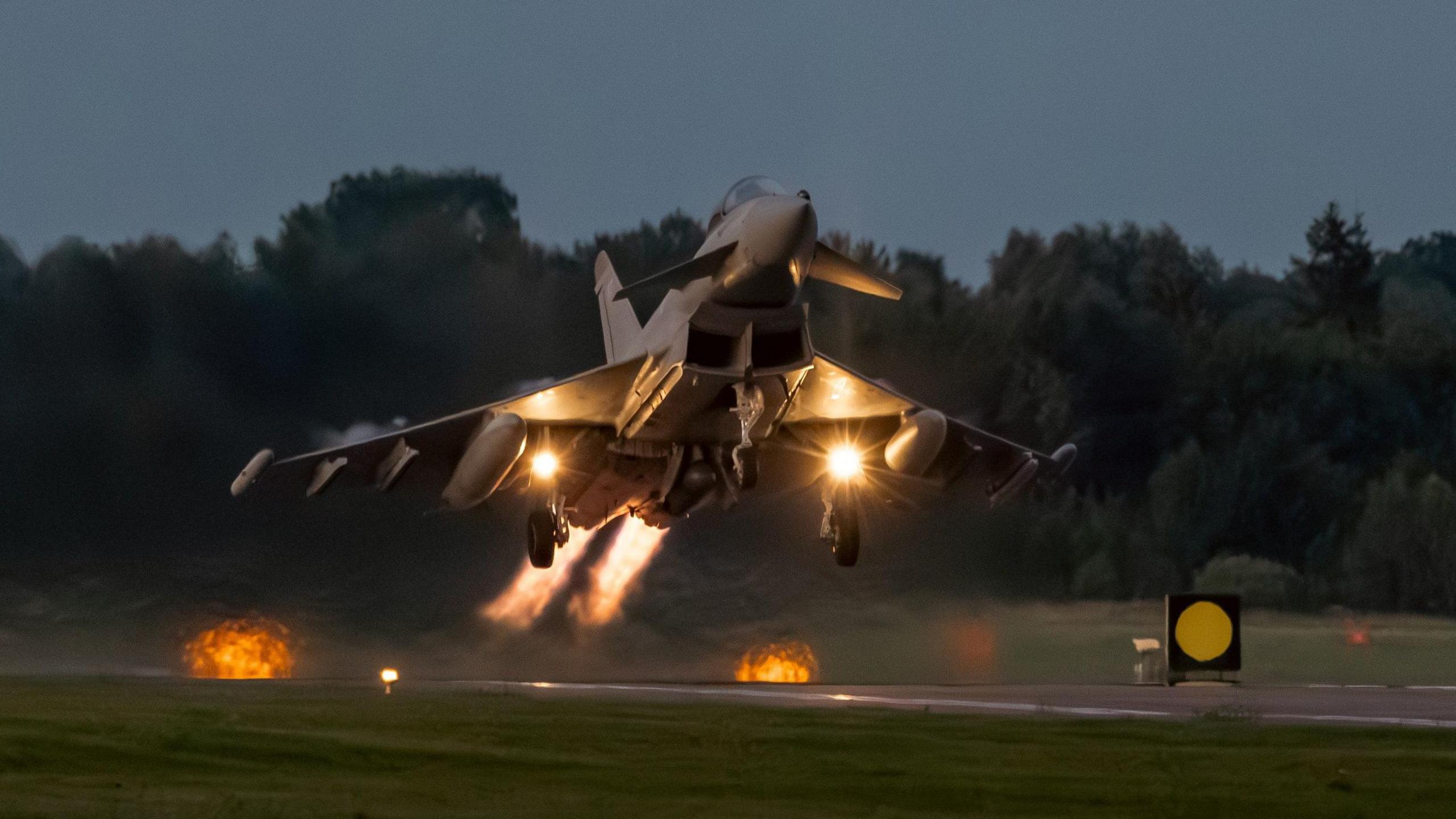 An RAF Typhoon fighter jet takes off