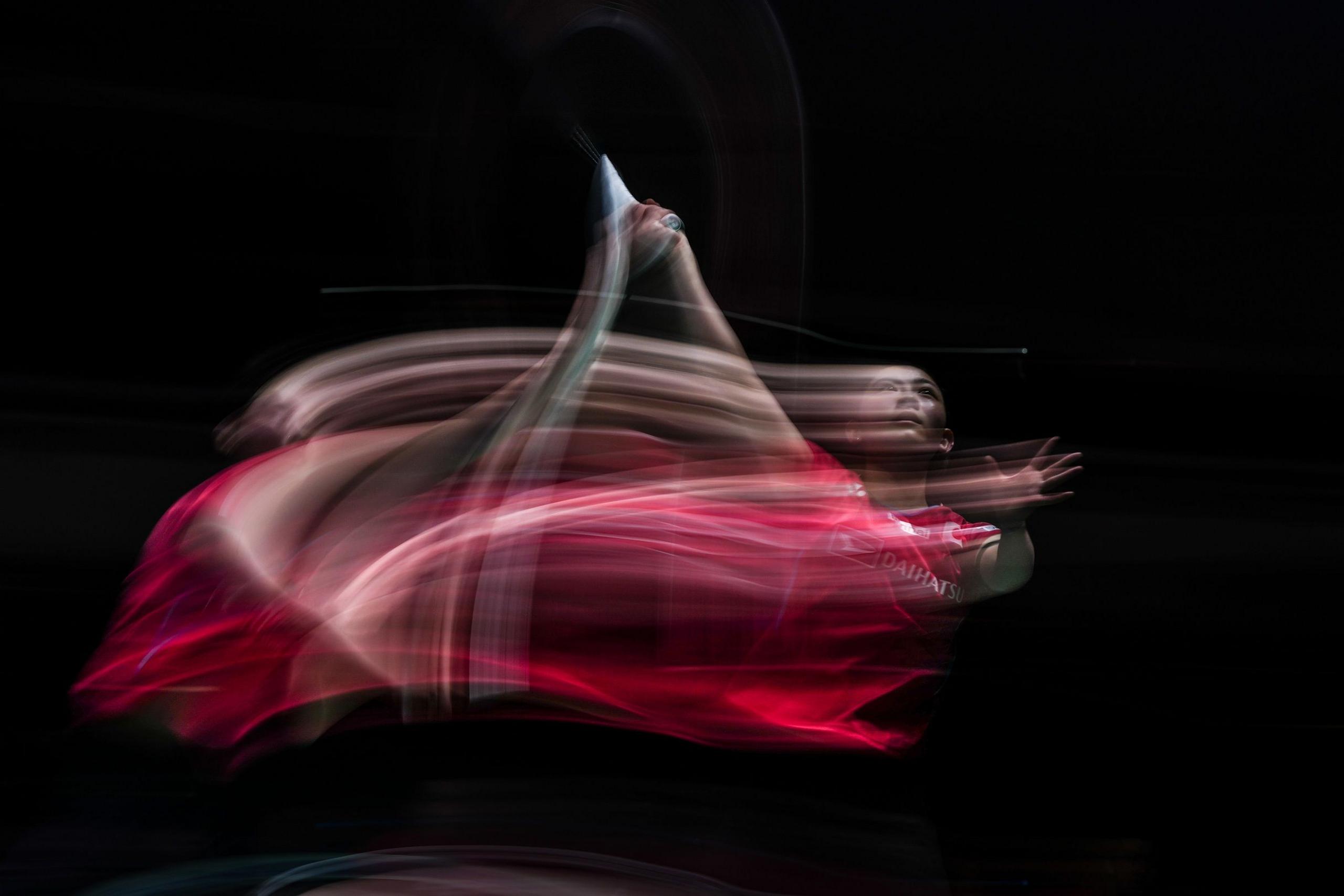 Japan's Tomoka Miyazaki competes in the women's singles first round of the Japan Open in Tokyo
