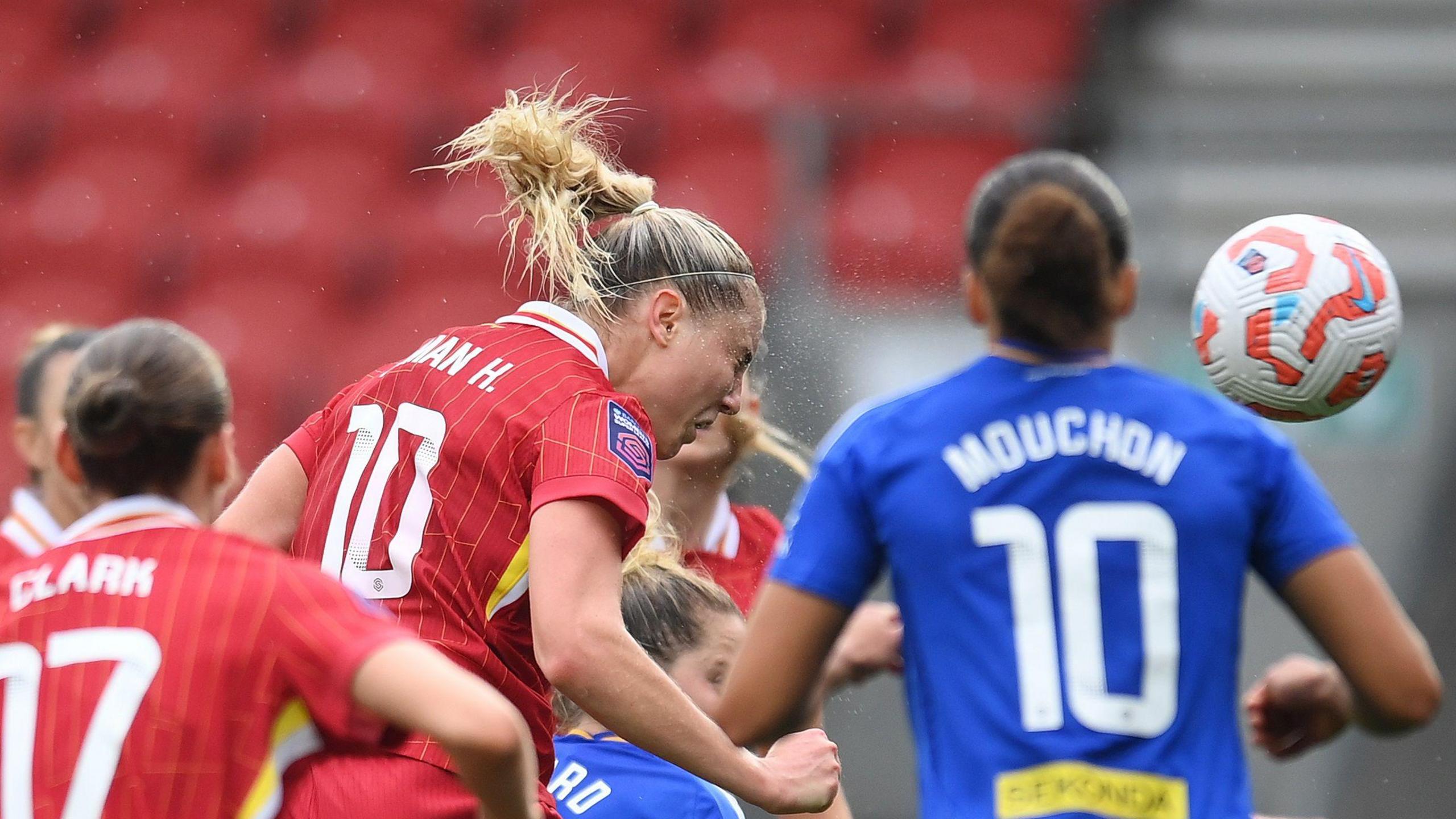 Sophie Roman Haug heads in Liverpool's opening goal against Leicester in the Women's Super League