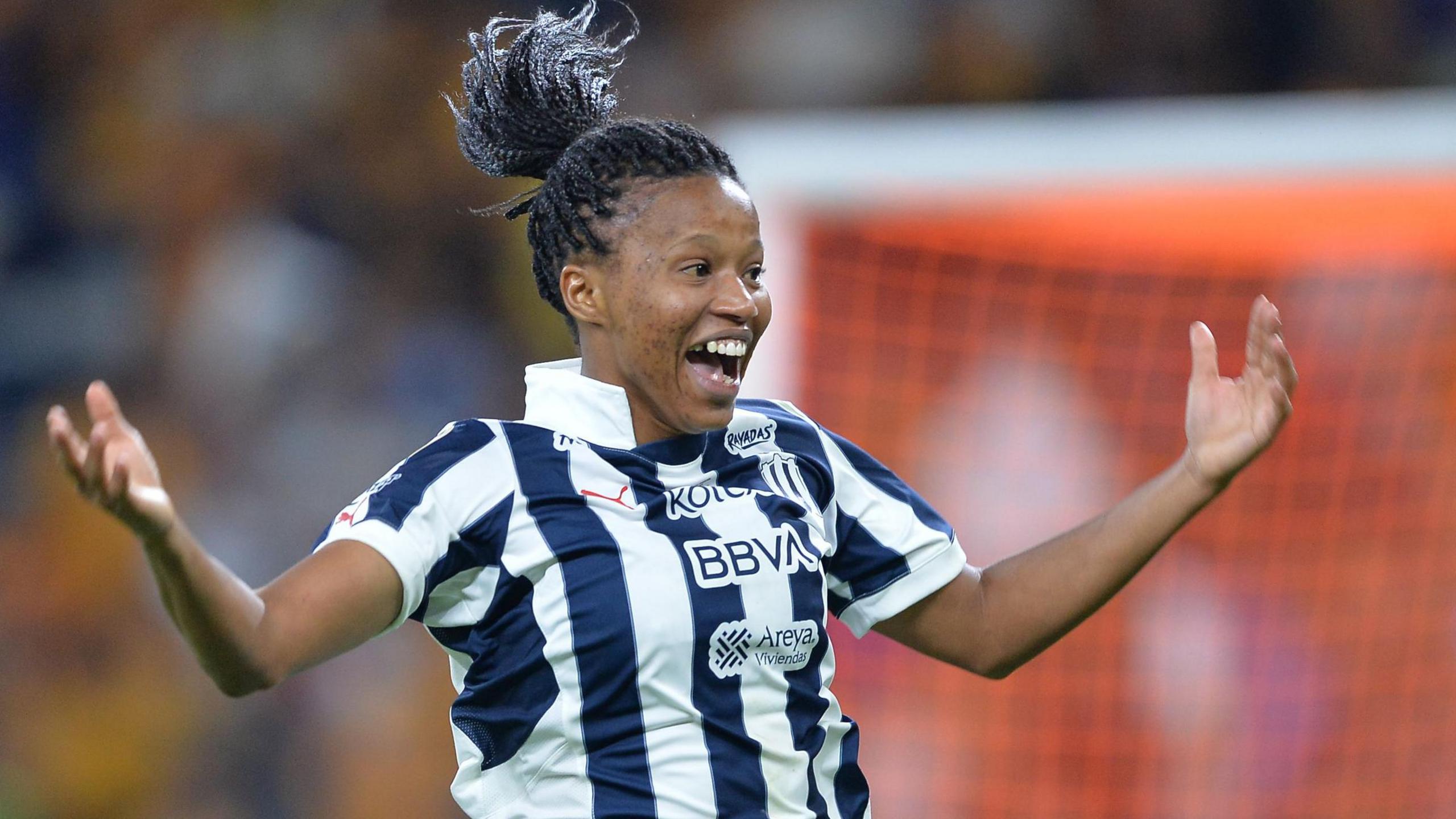 South Africa and Monterrey forward Jermaine Seoposenwe playing football