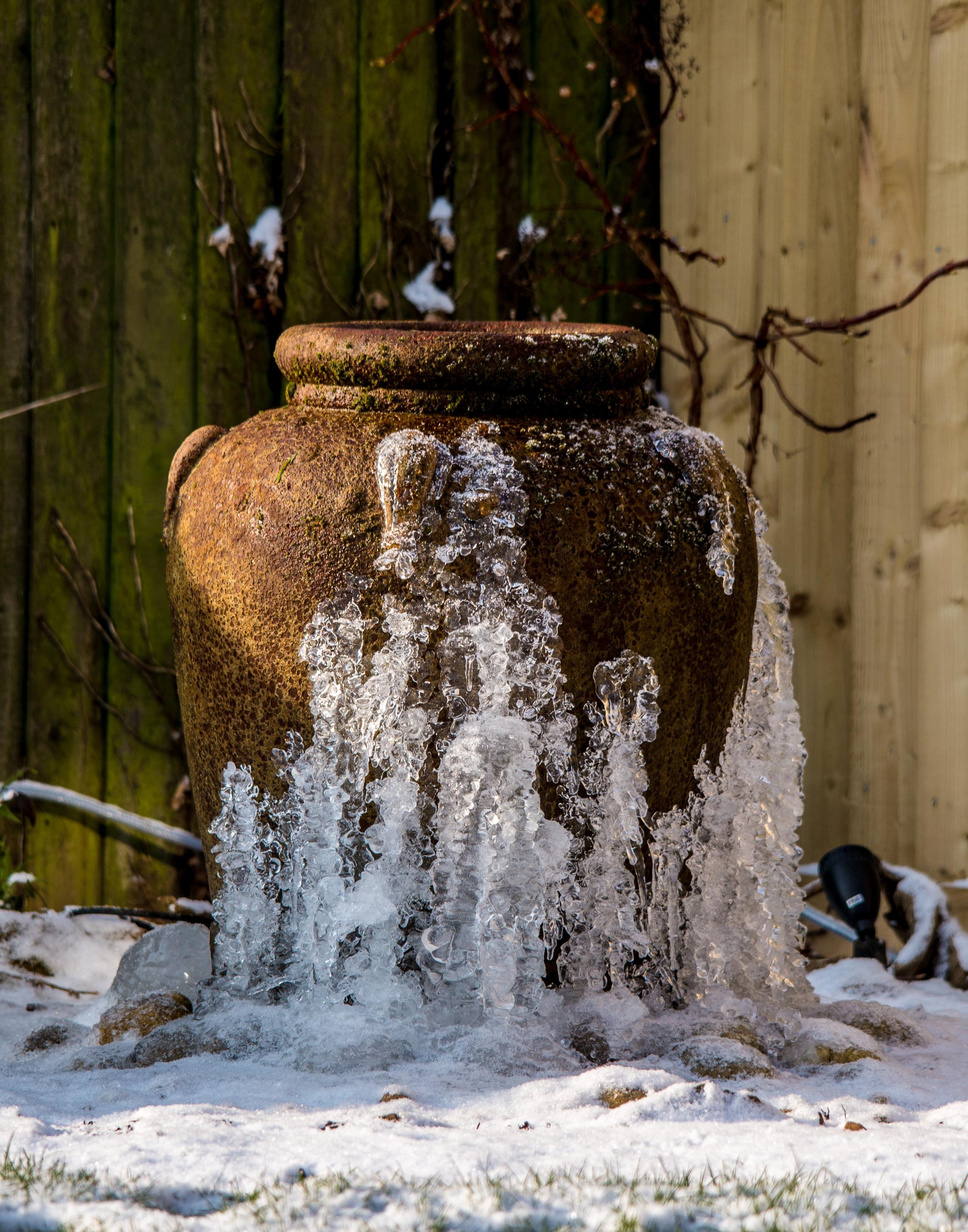 A frozen garden water feature