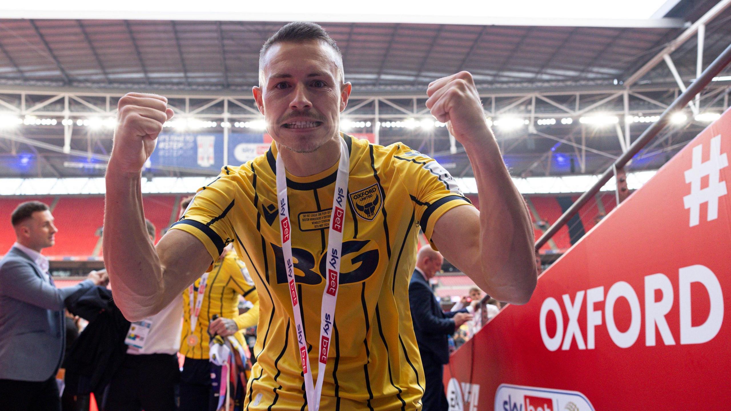 Billy Bodin celebrates winning promotion for Oxford United at Wembley