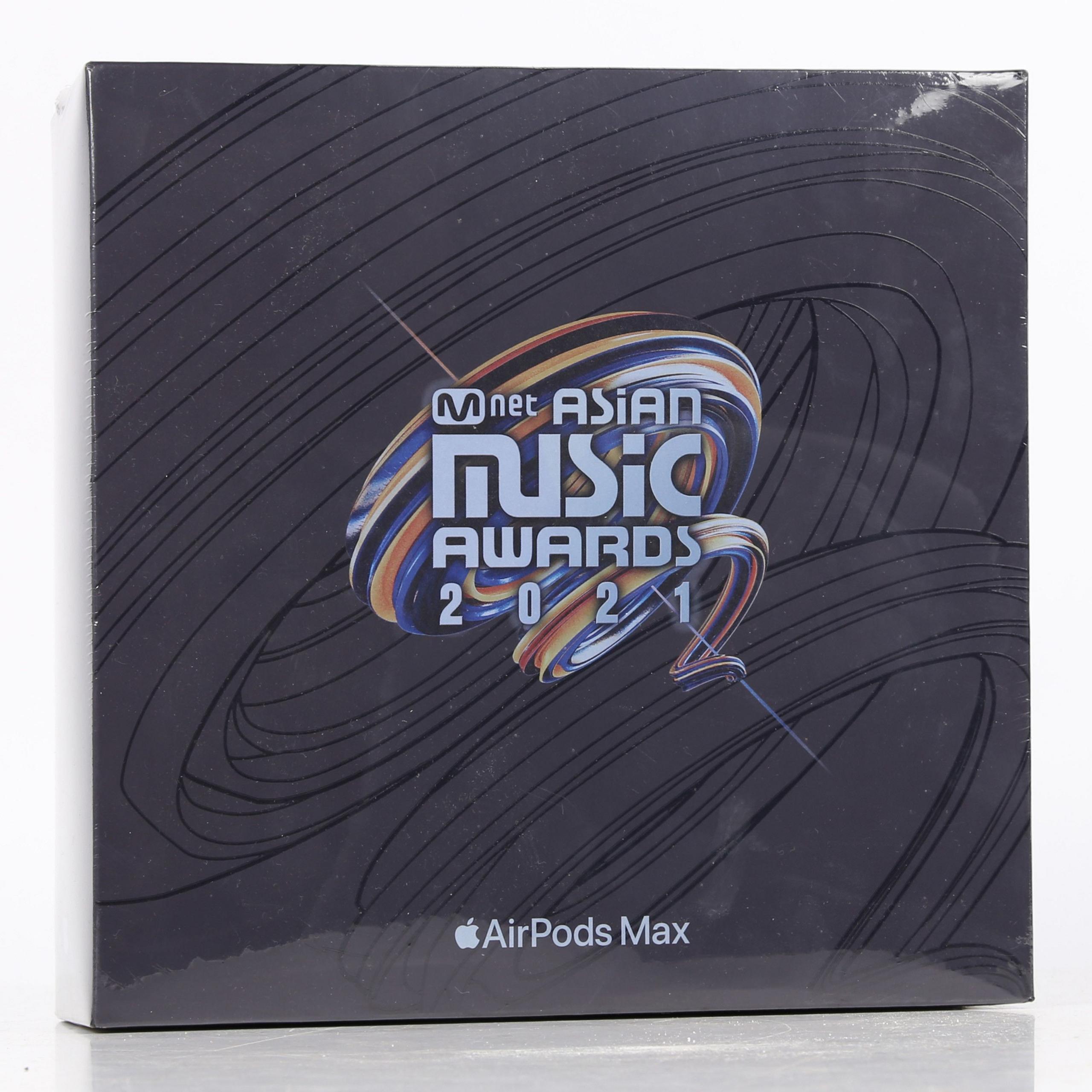 A general view of a sealed box of Apple's Airpods Max headphones. The square box is black and sealed. The logo of the M Net Asian Music Awards from 2021 is printed in the middle.