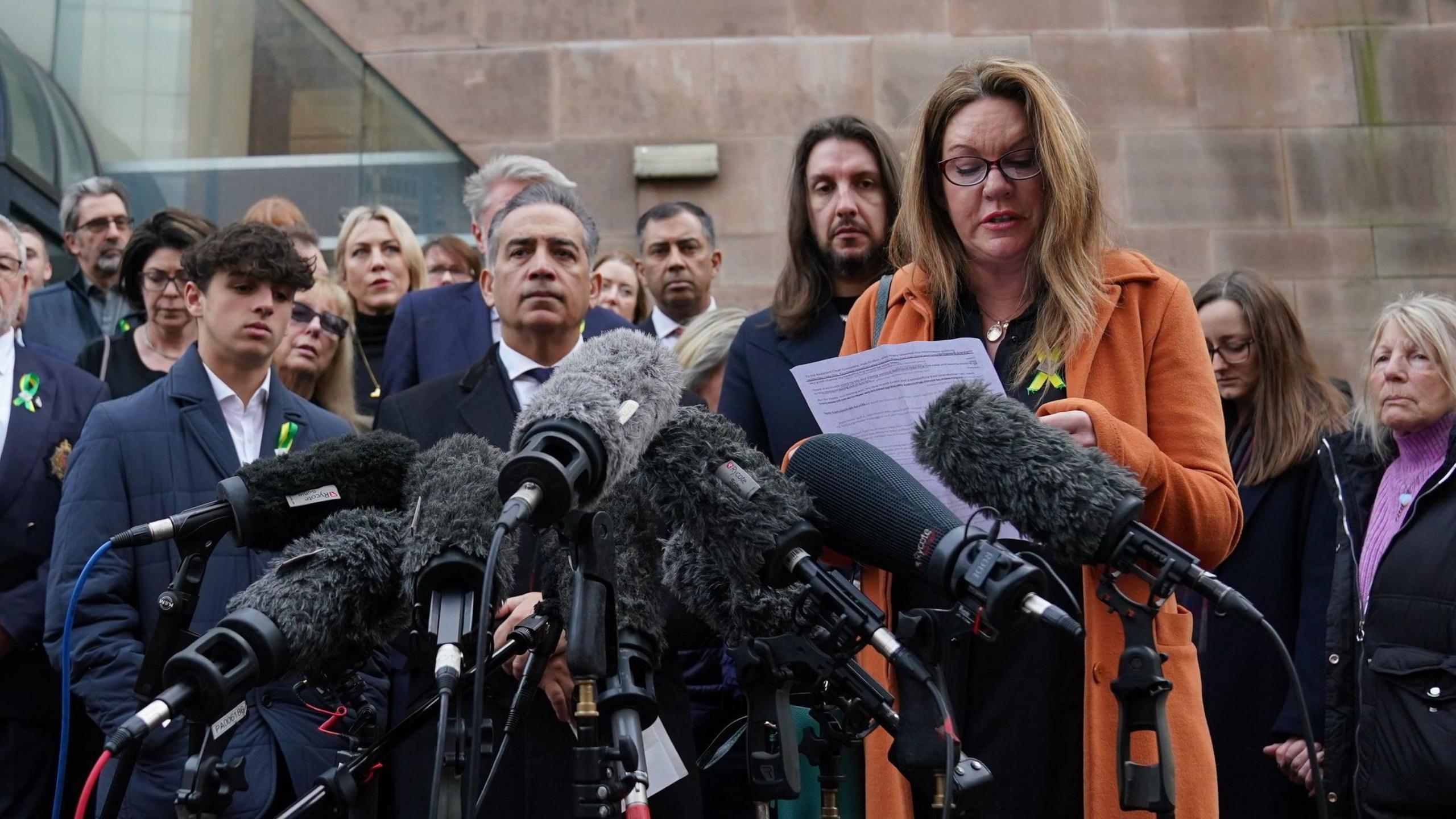 Emma Webber, mother of Barnaby Webber making a statement alongside relatives of the Nottingham attacks victims, outside Nottingham Crown Court in January 2024. 