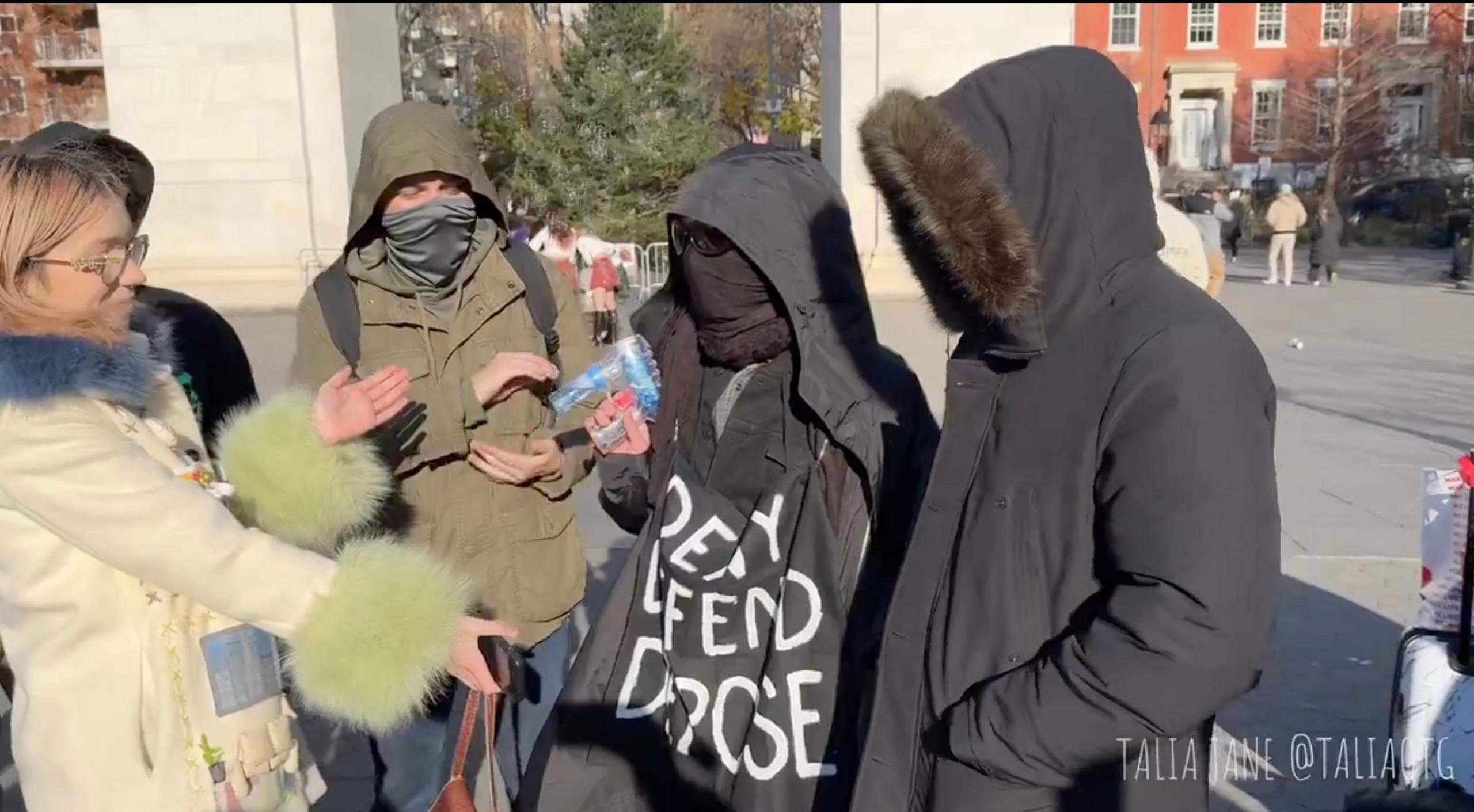 Men in hoodies in a park in New York City