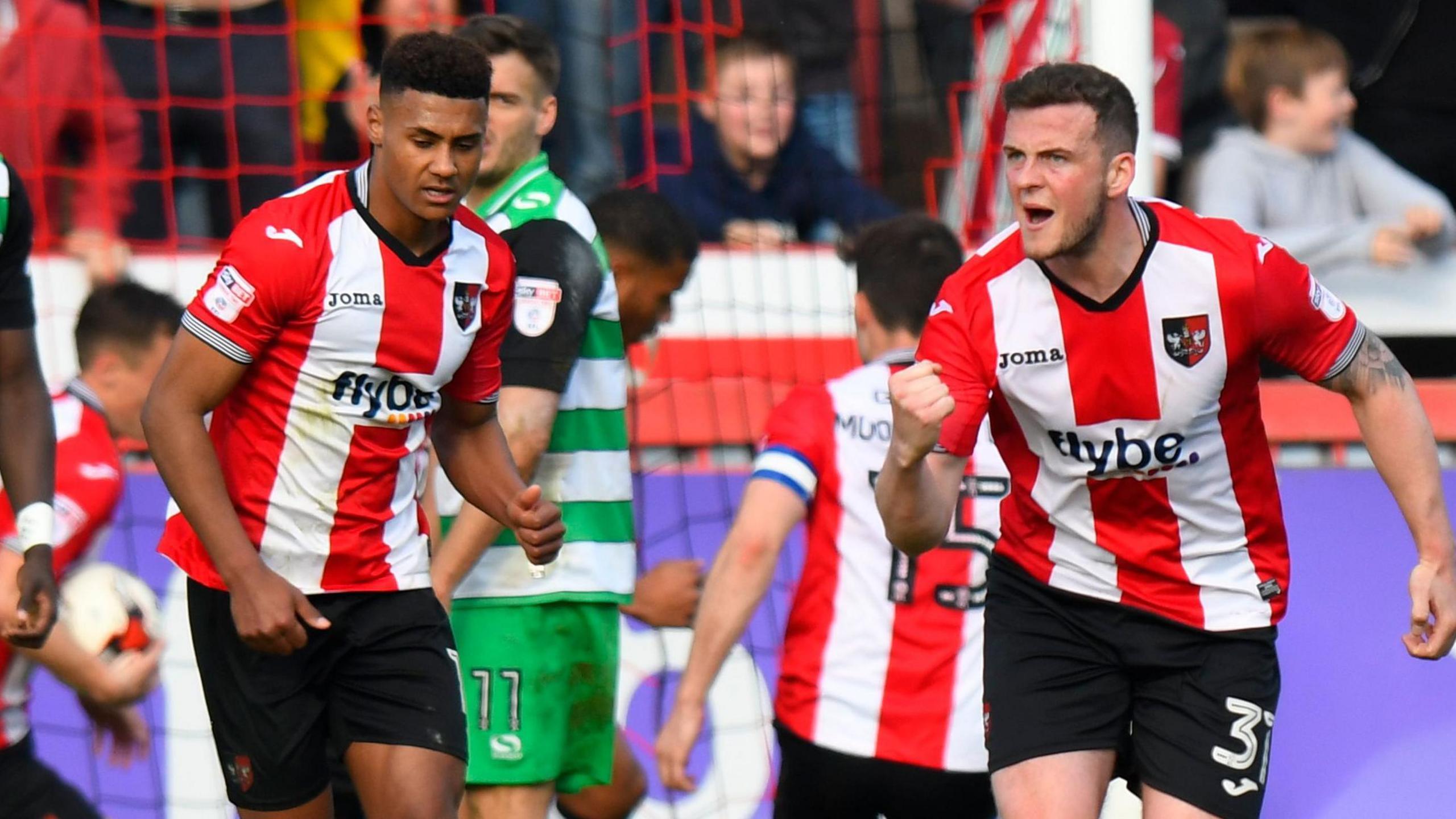 Ollie Watkins (right) celebrates with Pierce Sweeney