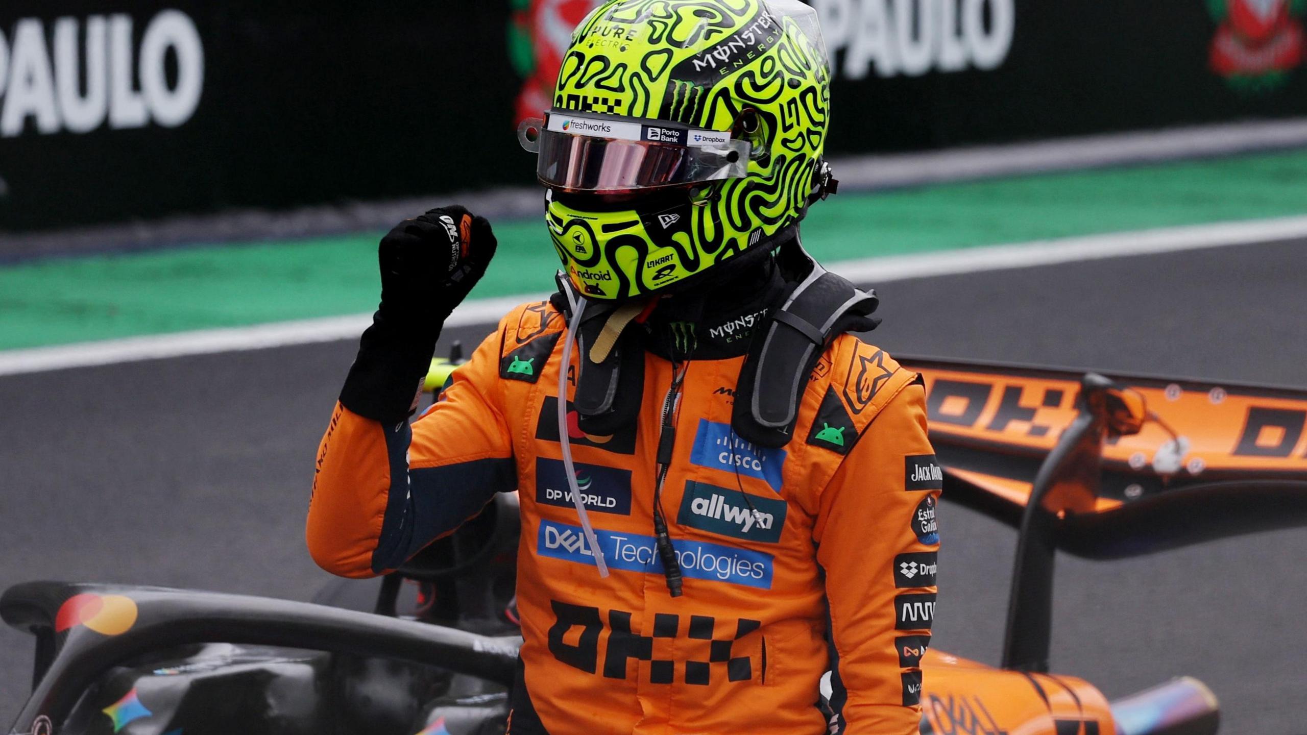 McLaren's Lando Norris clenches his fist in celebration after winning the Sao Paulo Grand Prix sprint race