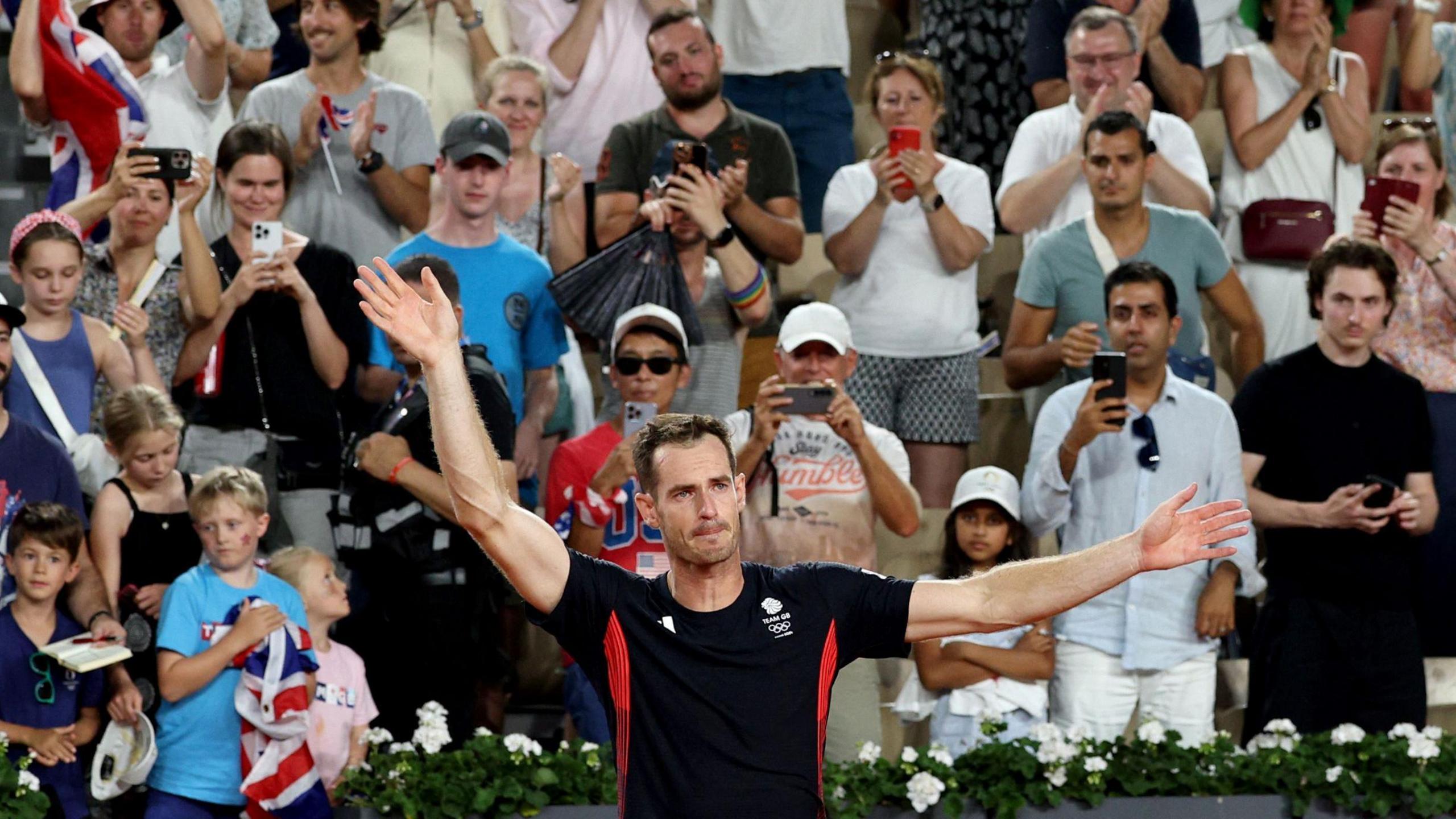 Sir Andy Murray waves farewell after defeat at the Olympics