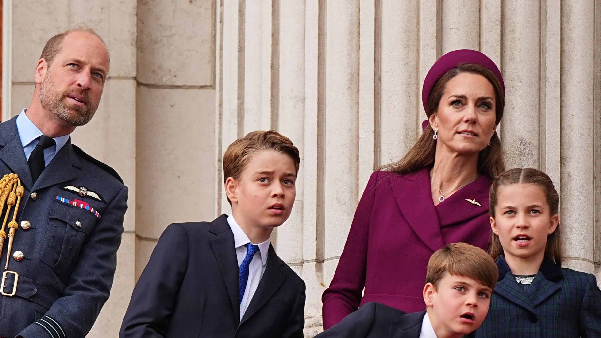 The Prince and Princess of Wales and their children on balcony of Buckingham Palace