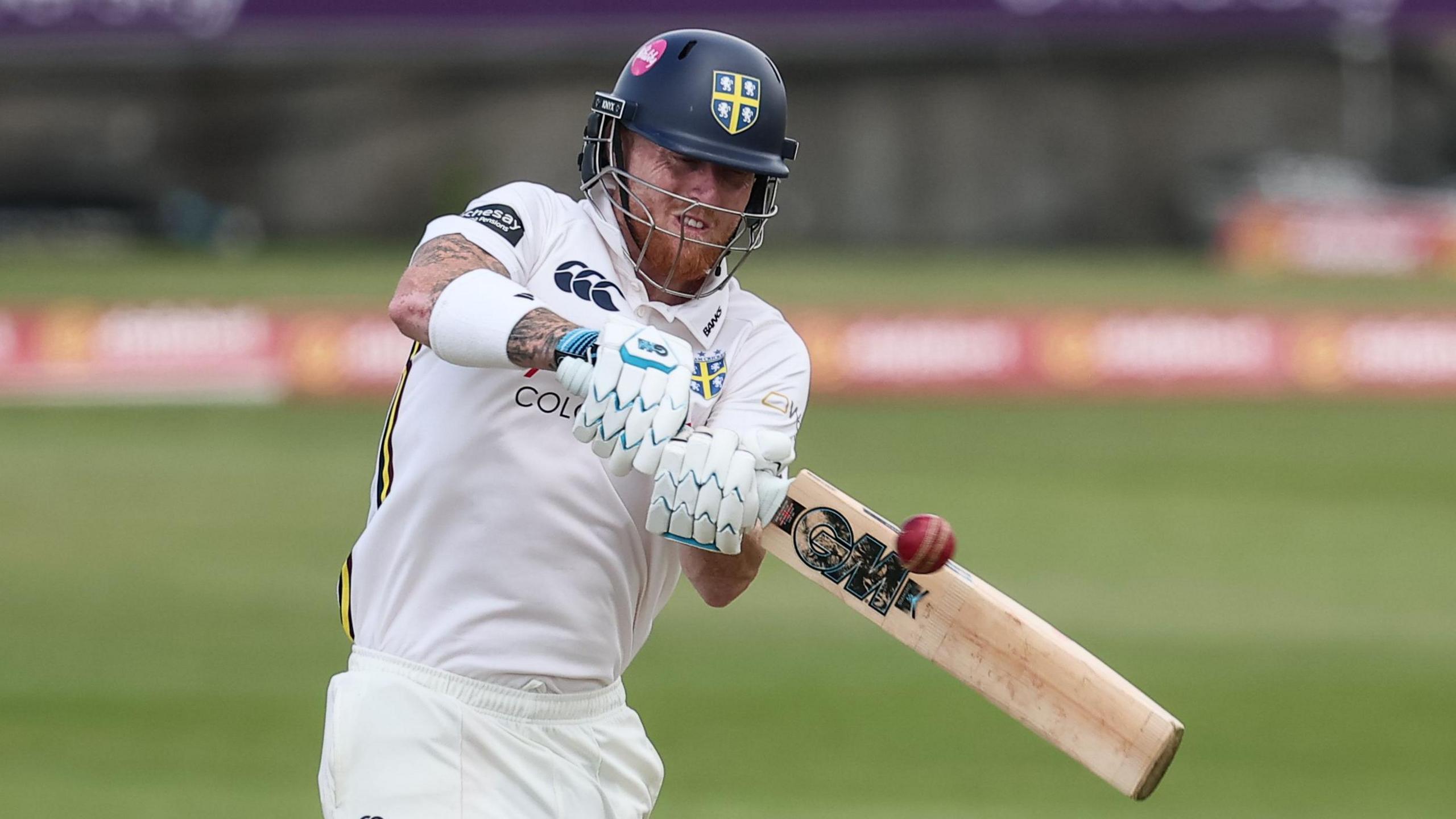 Ben Stokes, wearing a Durham batting helmet, plays a shot