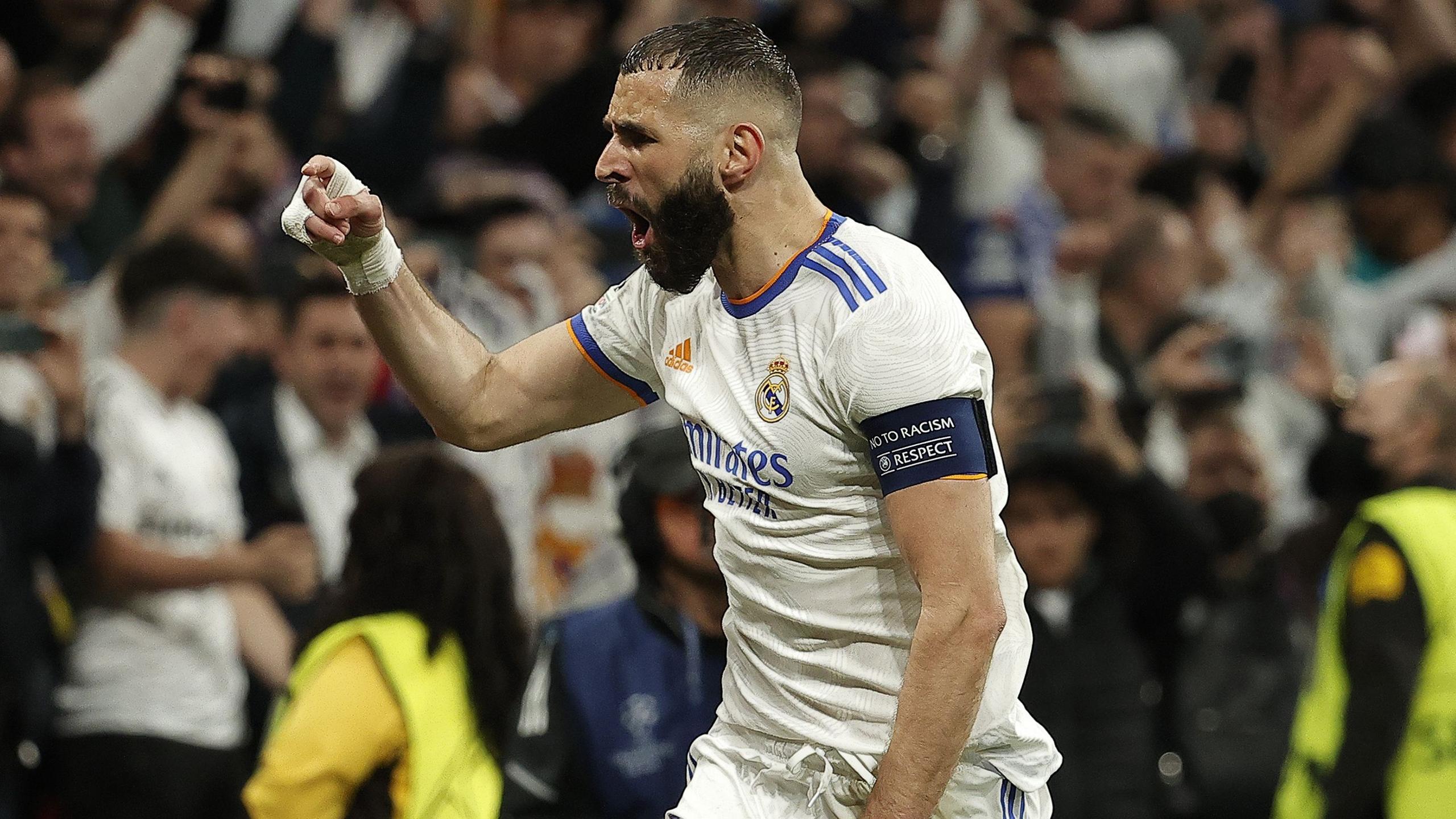 Karim Benzema of Real Madrid celebrates scoring against Man City