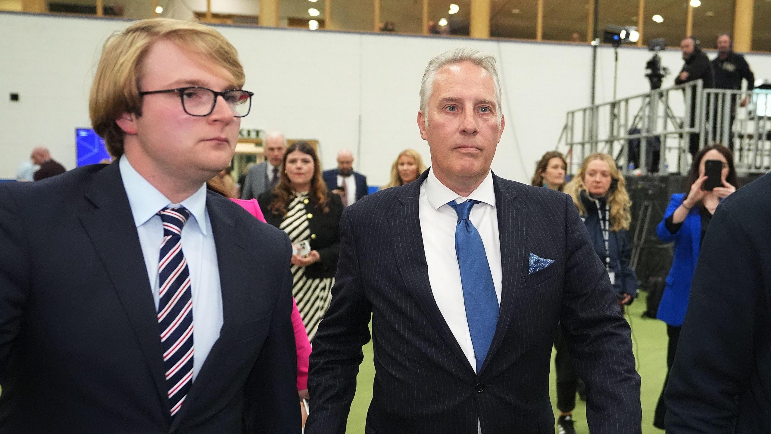 Ian Paisley (right) walking through the Magherafelt count centre