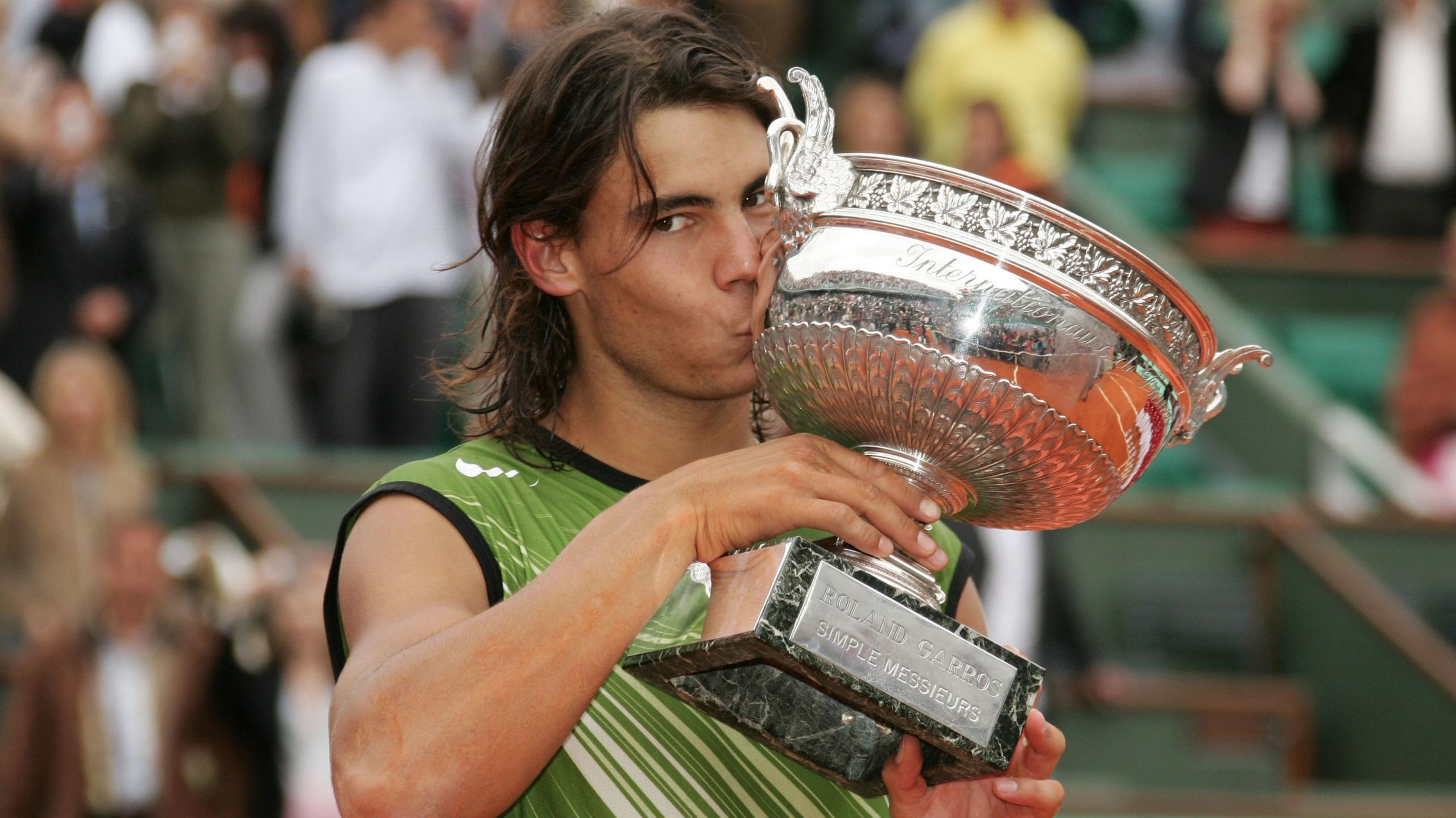 Rafael Nadal with his first French Open trophy in 2005