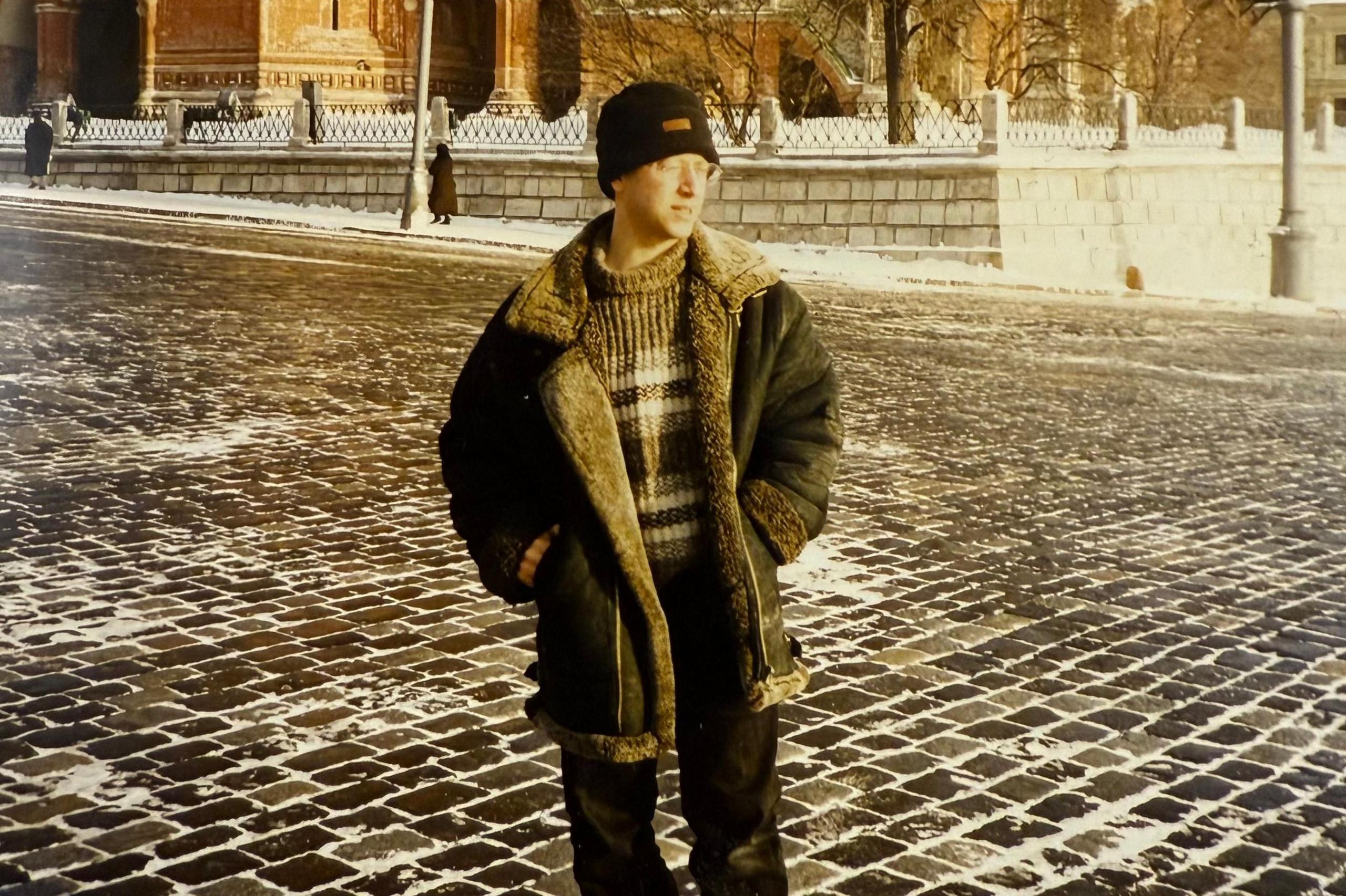 A young Steve Rosenberg is seen wearing a black hat and a thick jacket, in Moscow in 1989/90.