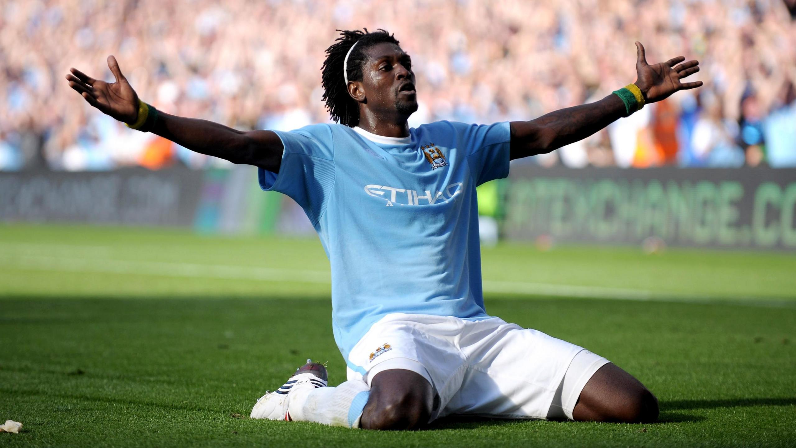 Emmanuel Adebayor celebrates scoring for Manchester City against Arsenal