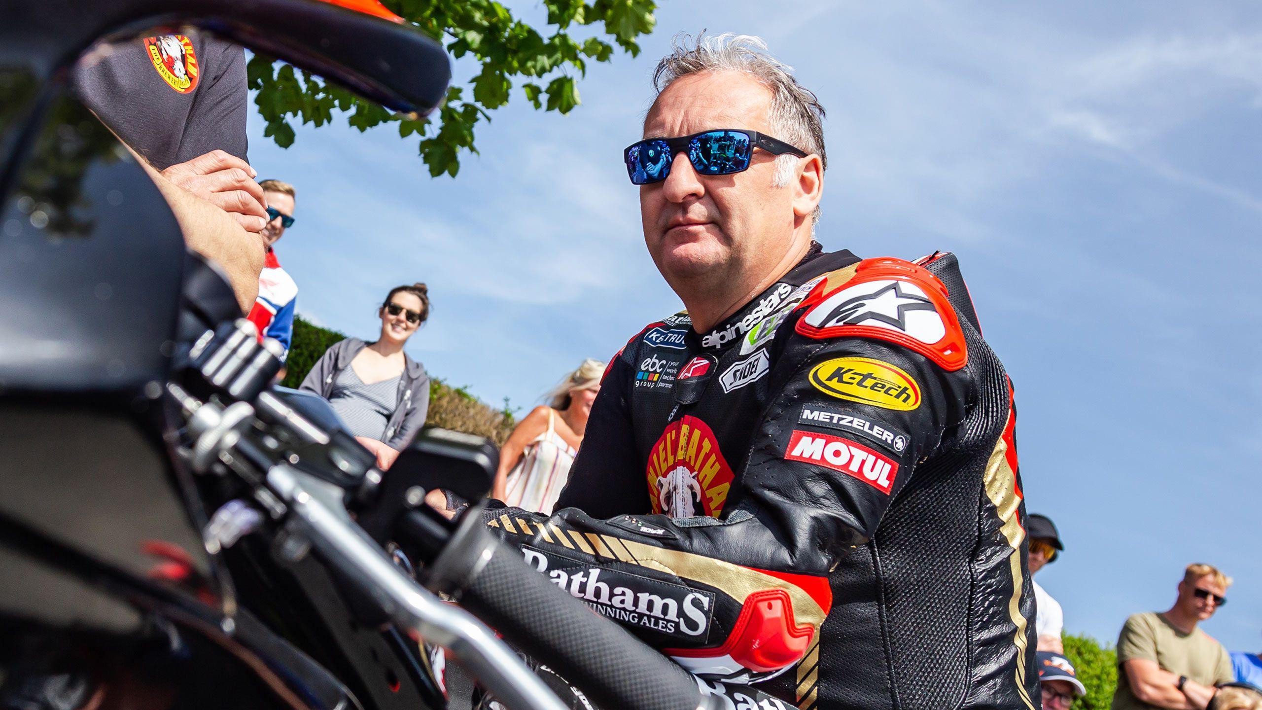 Michael Rutter in his leathers with blue sunglasses