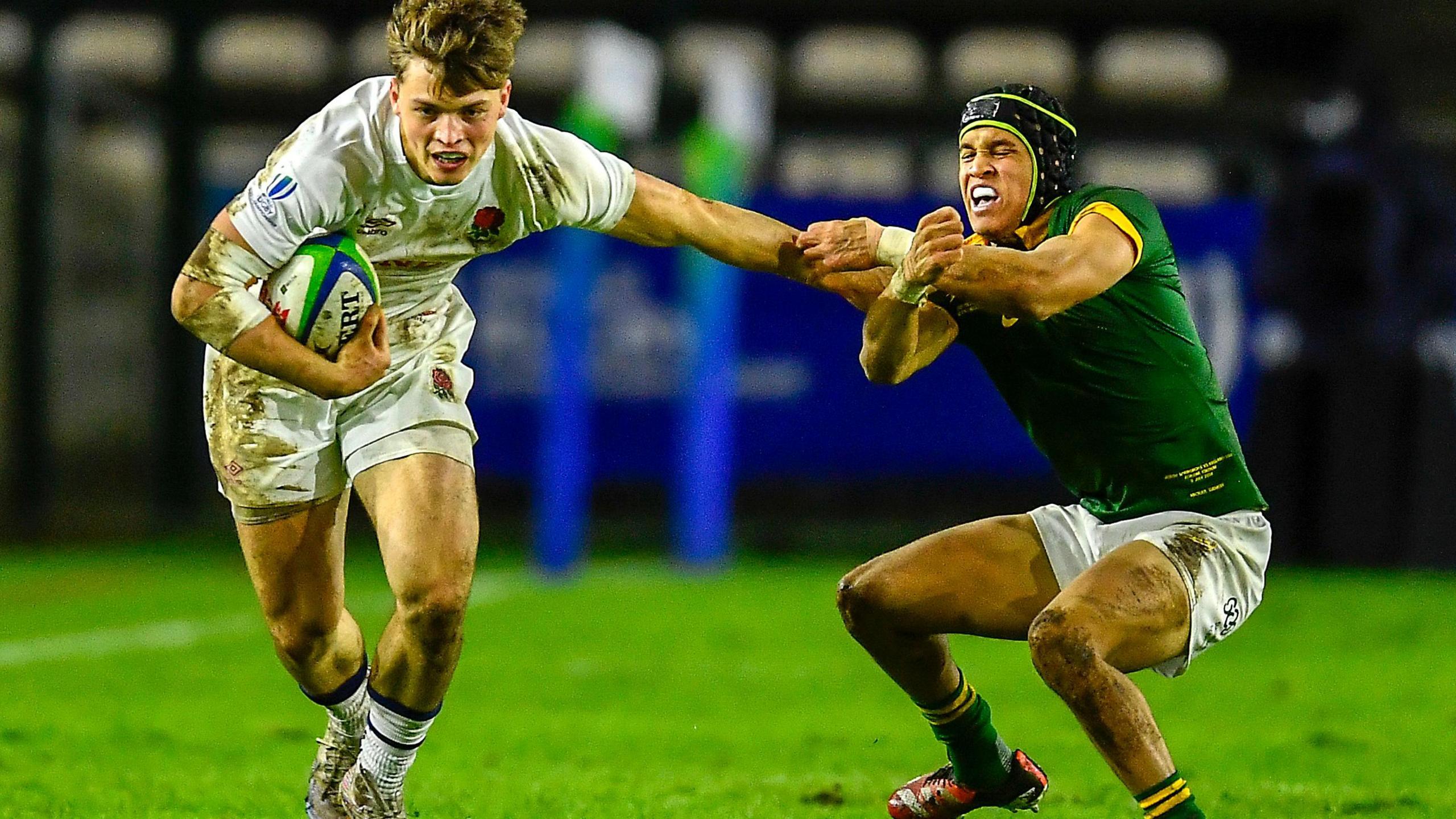 Jack Bracken beats a South African tackler