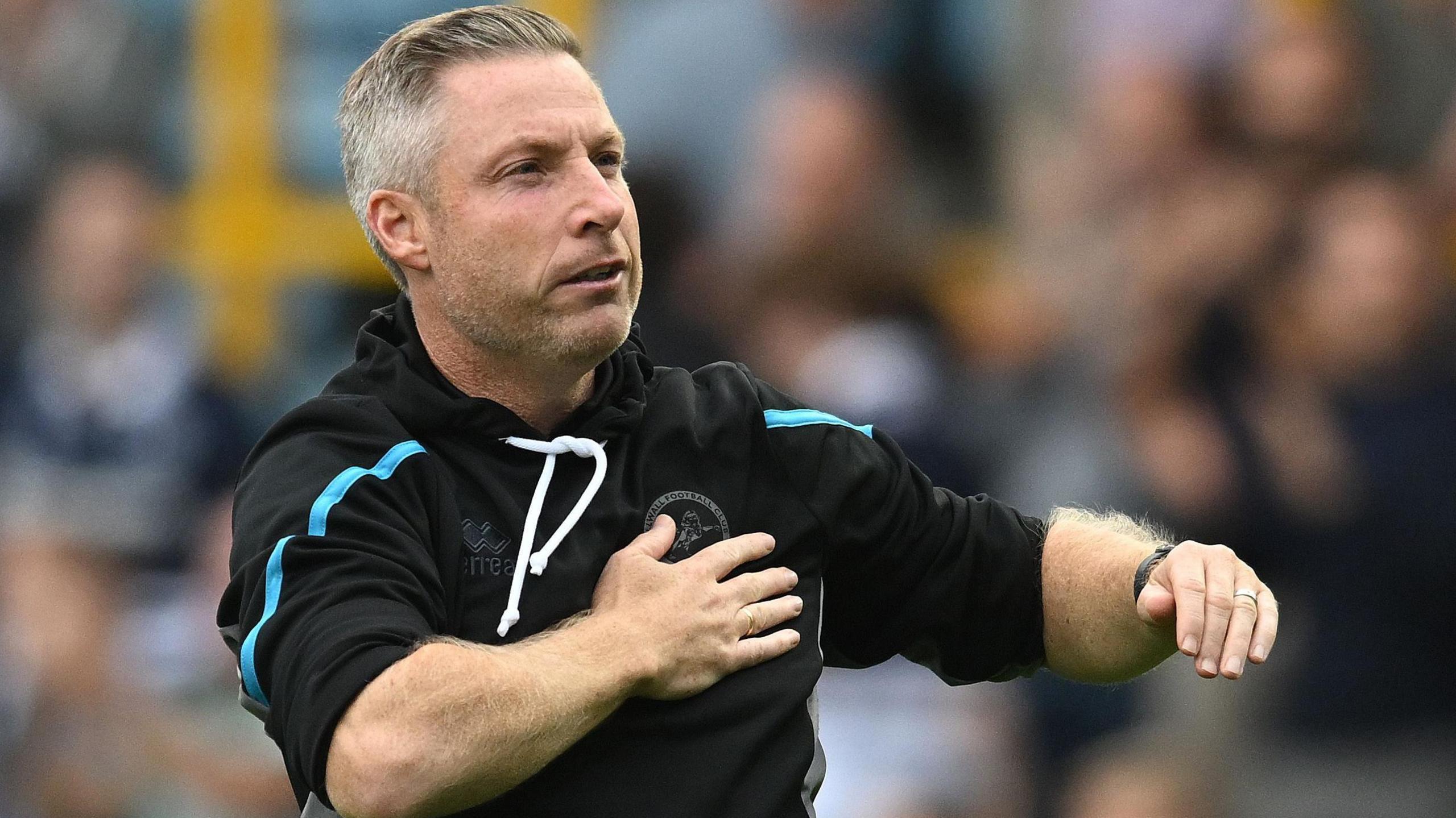 Millwall manager Neil Harris salutes Lions fans