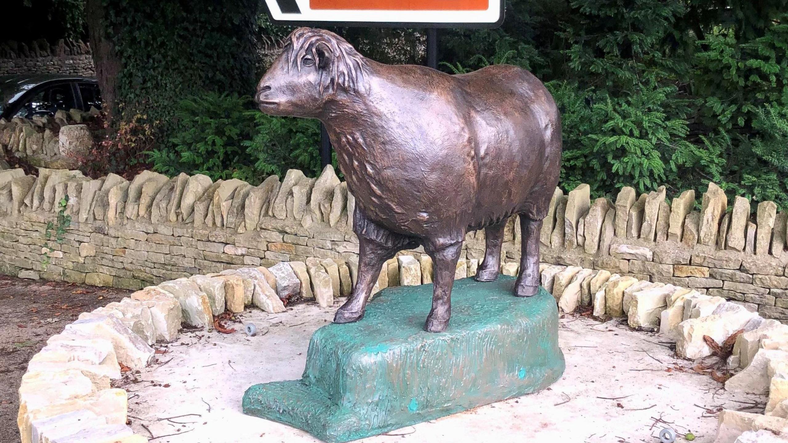 The bronze sheep on the plinth 