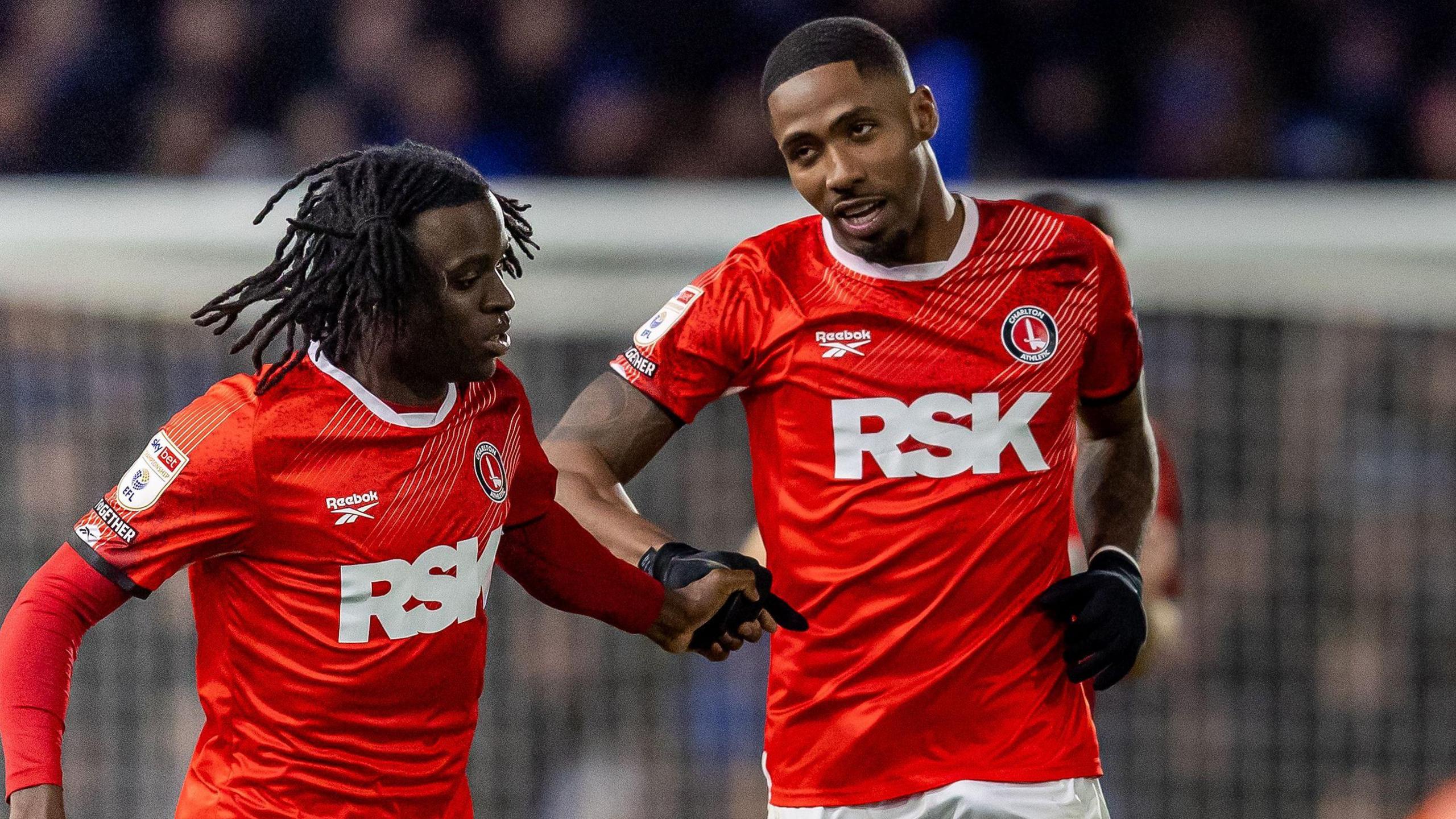 Tyreece Campbell is congratulated by his teammates after breaking his season's duck with a goal for Charlton
