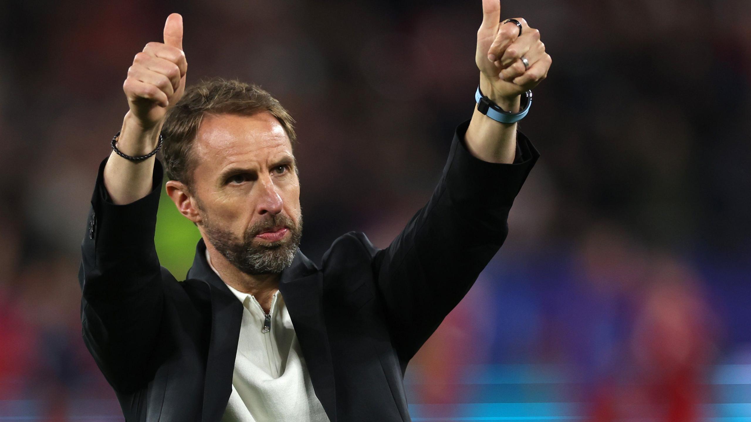 Gareth Southgate gives a thumbs-up gesture