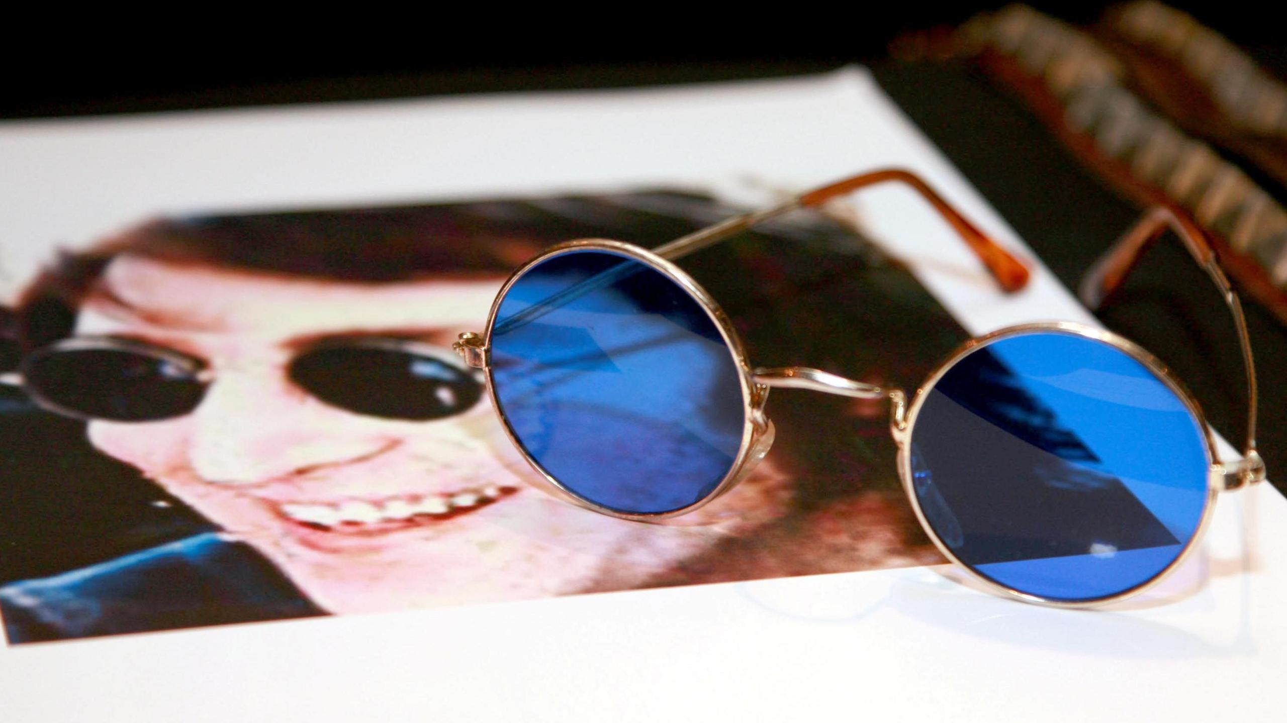 John Lennon s glasses and Abbey Road photos to be auctioned in Surrey BBC News