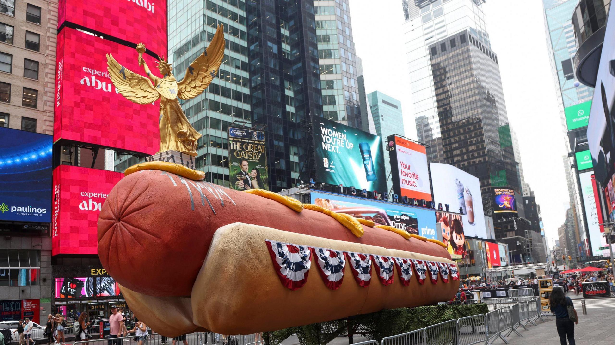 Giant hot dog sculpture in Times Square.