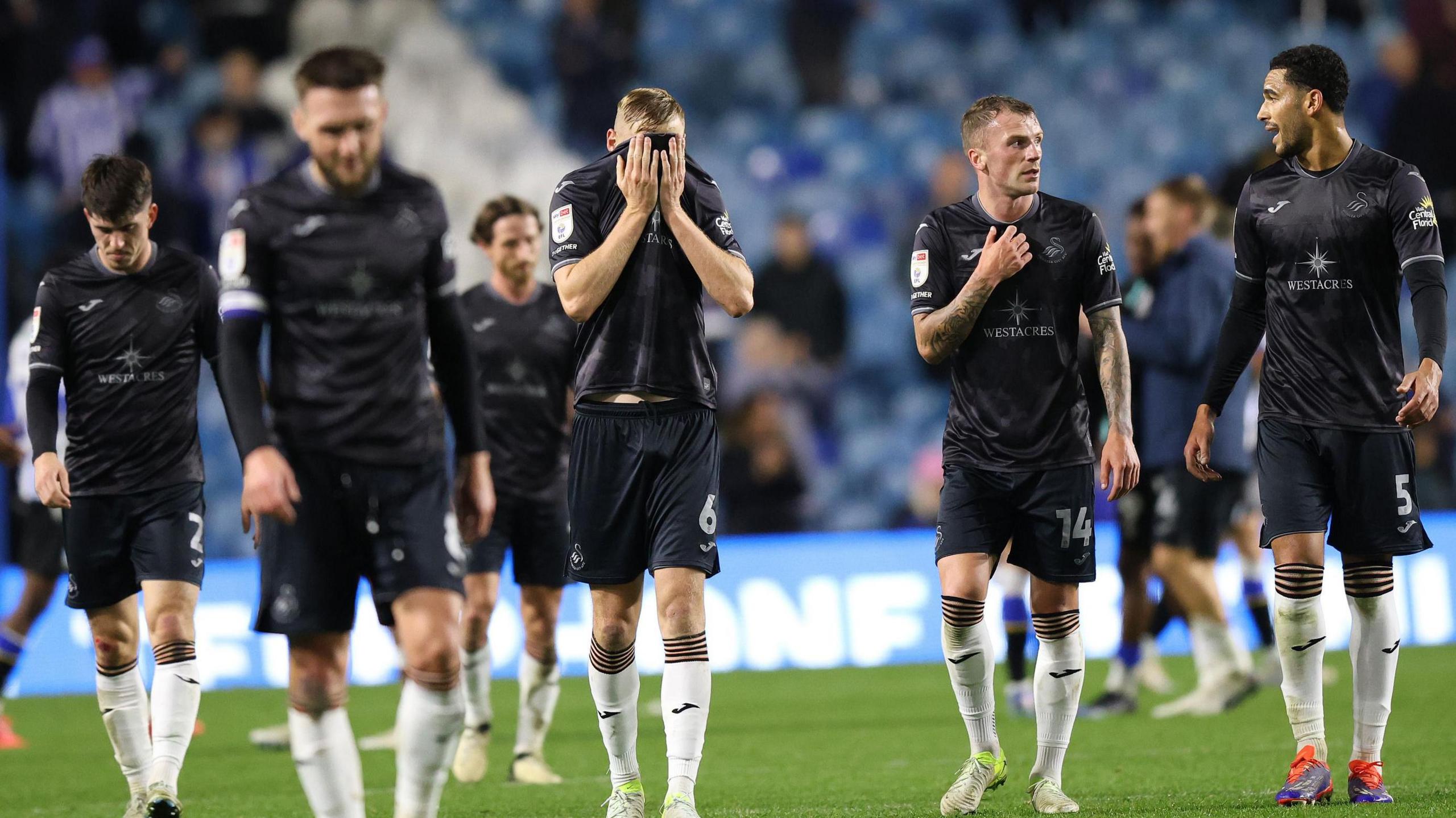 Swansea players at the end of their draw with Sheffield Wednesday