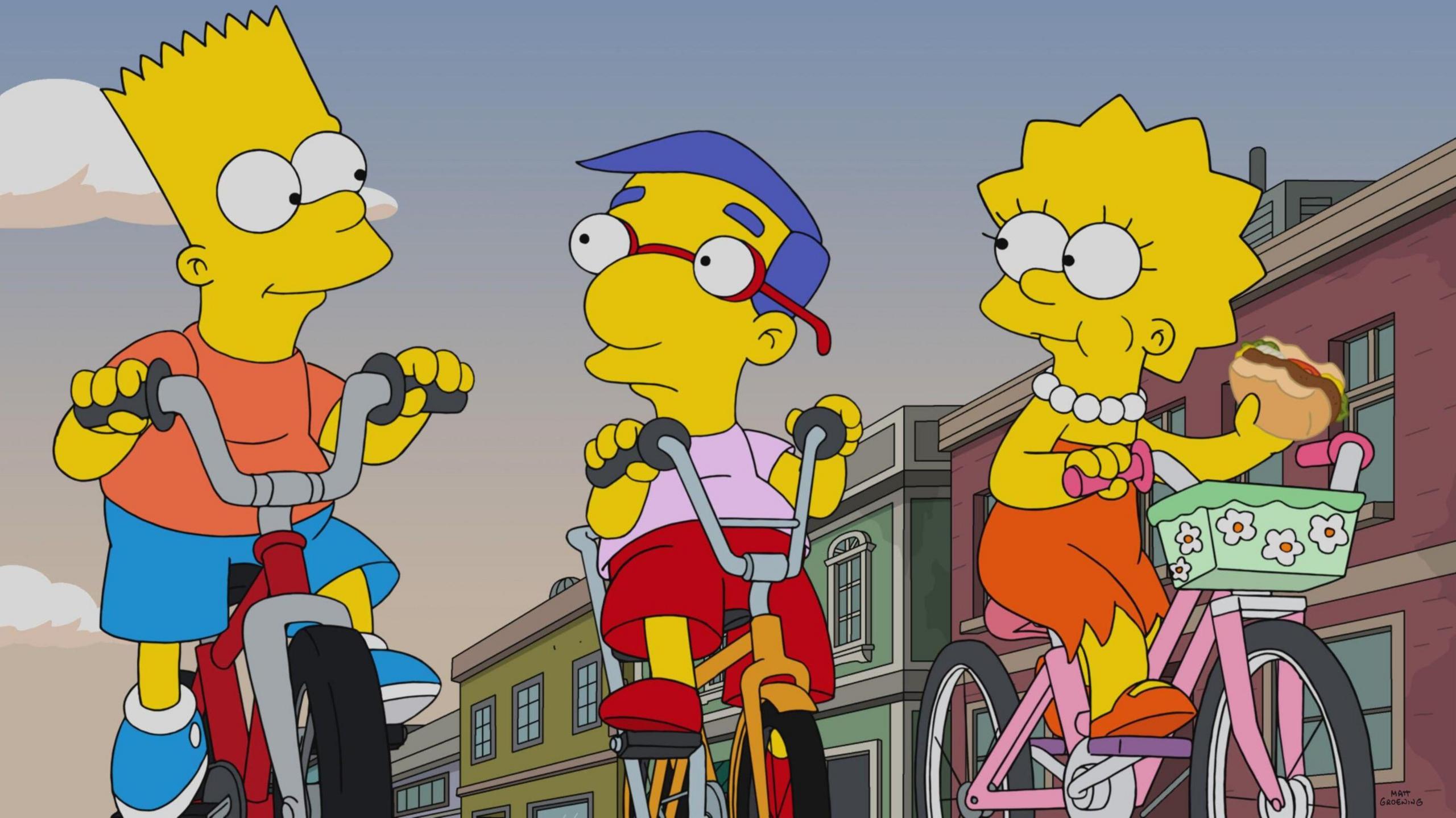 Bart Simpson, Milhouse and Lisa Simpson cycling, in a still from The Simpsons