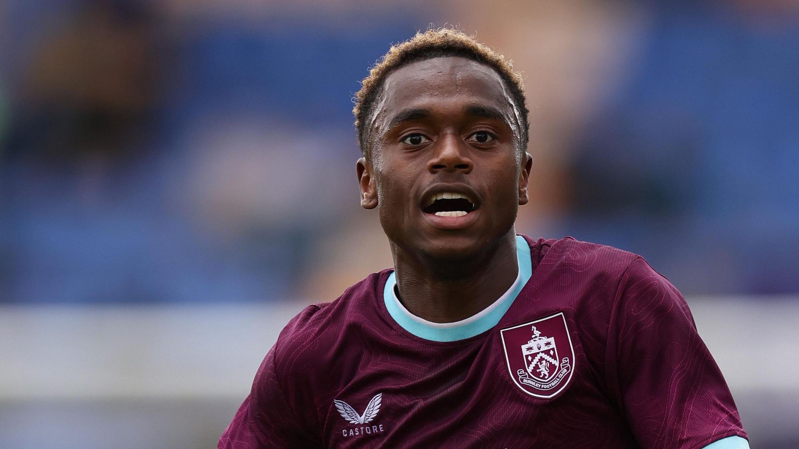 Jaydon Banel in action for Burnley and running with his mouth open