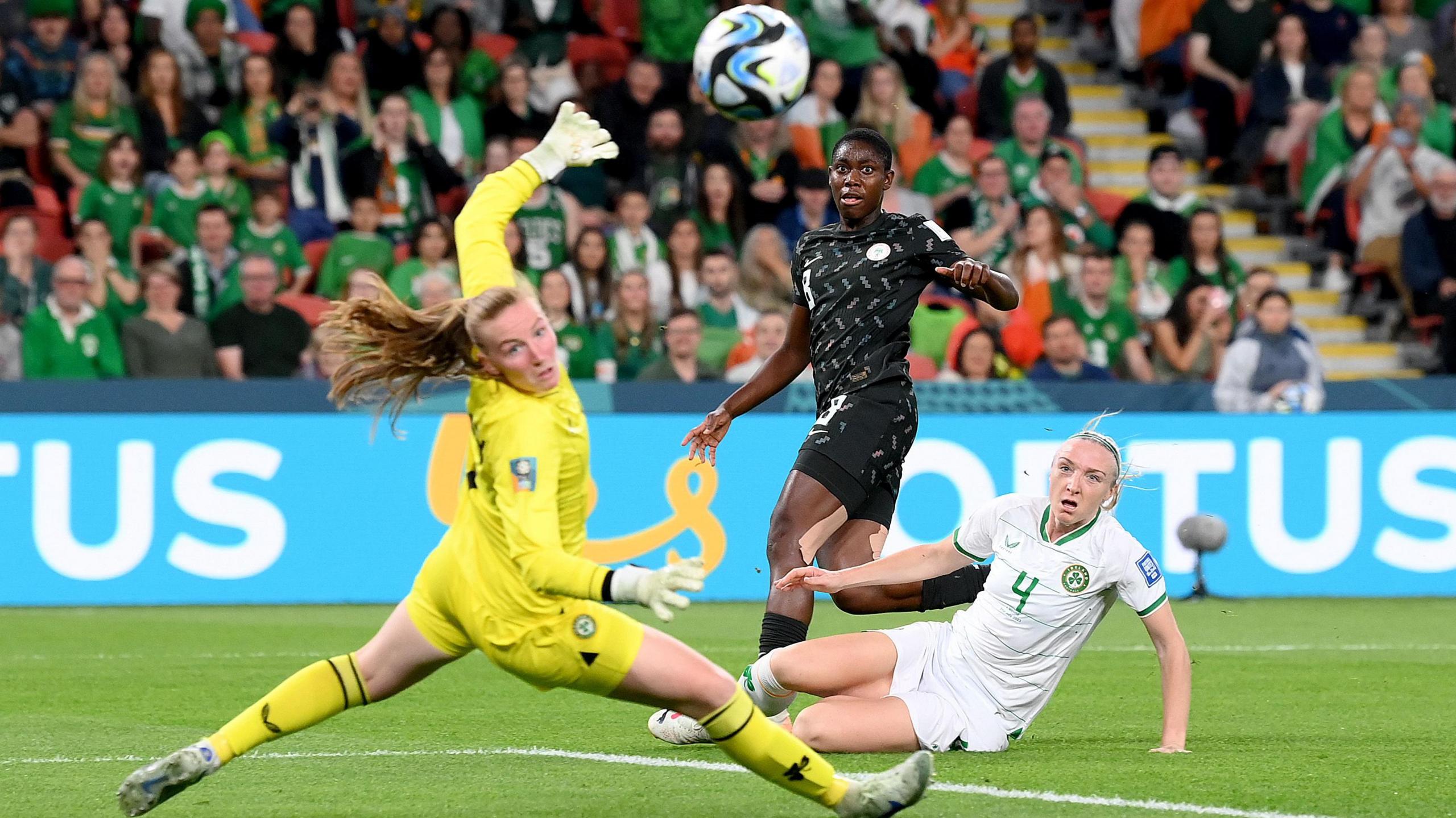 Asisat Oshoala playing football for Nigeria