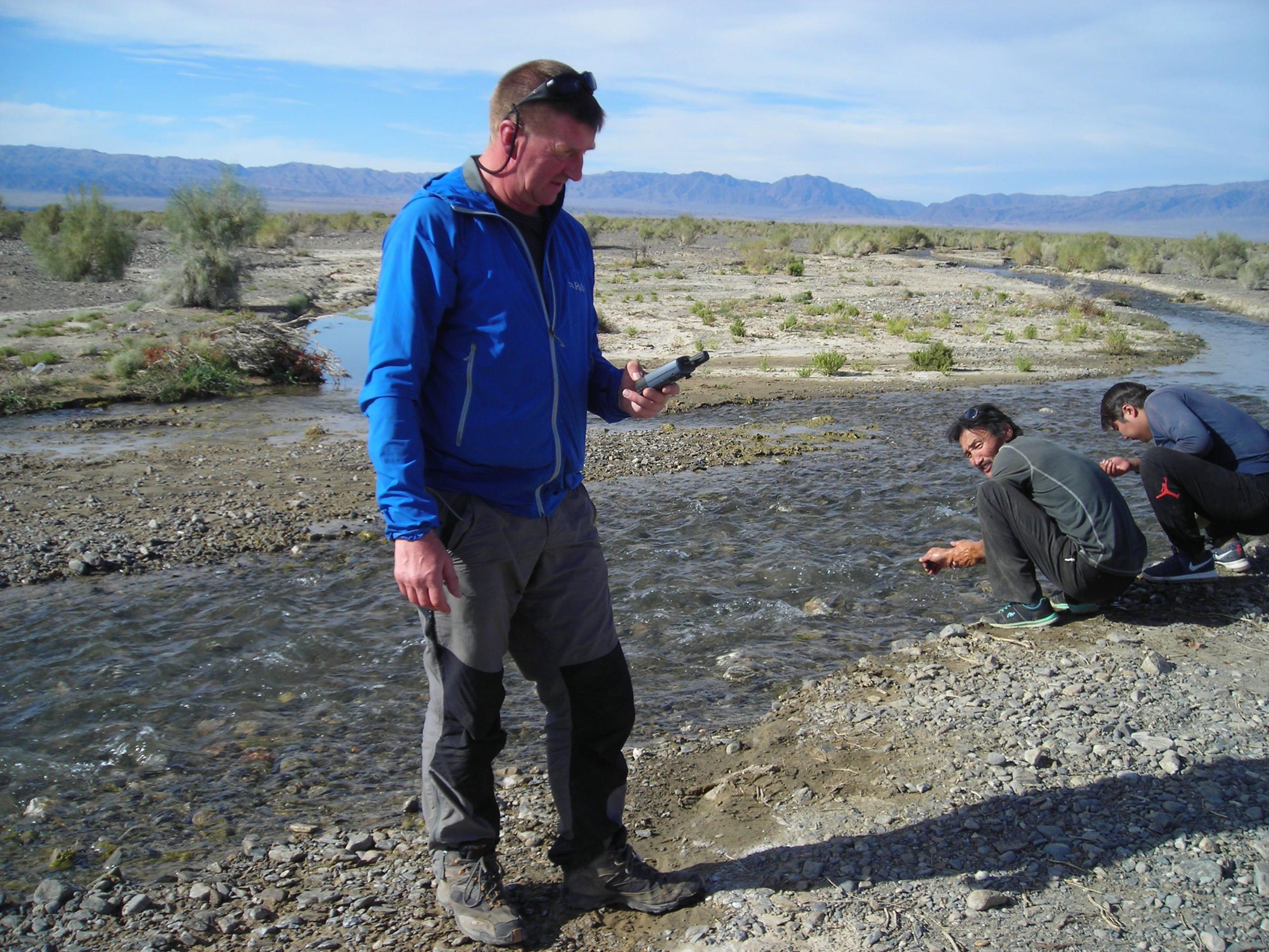 Newall marking water in the Gobi