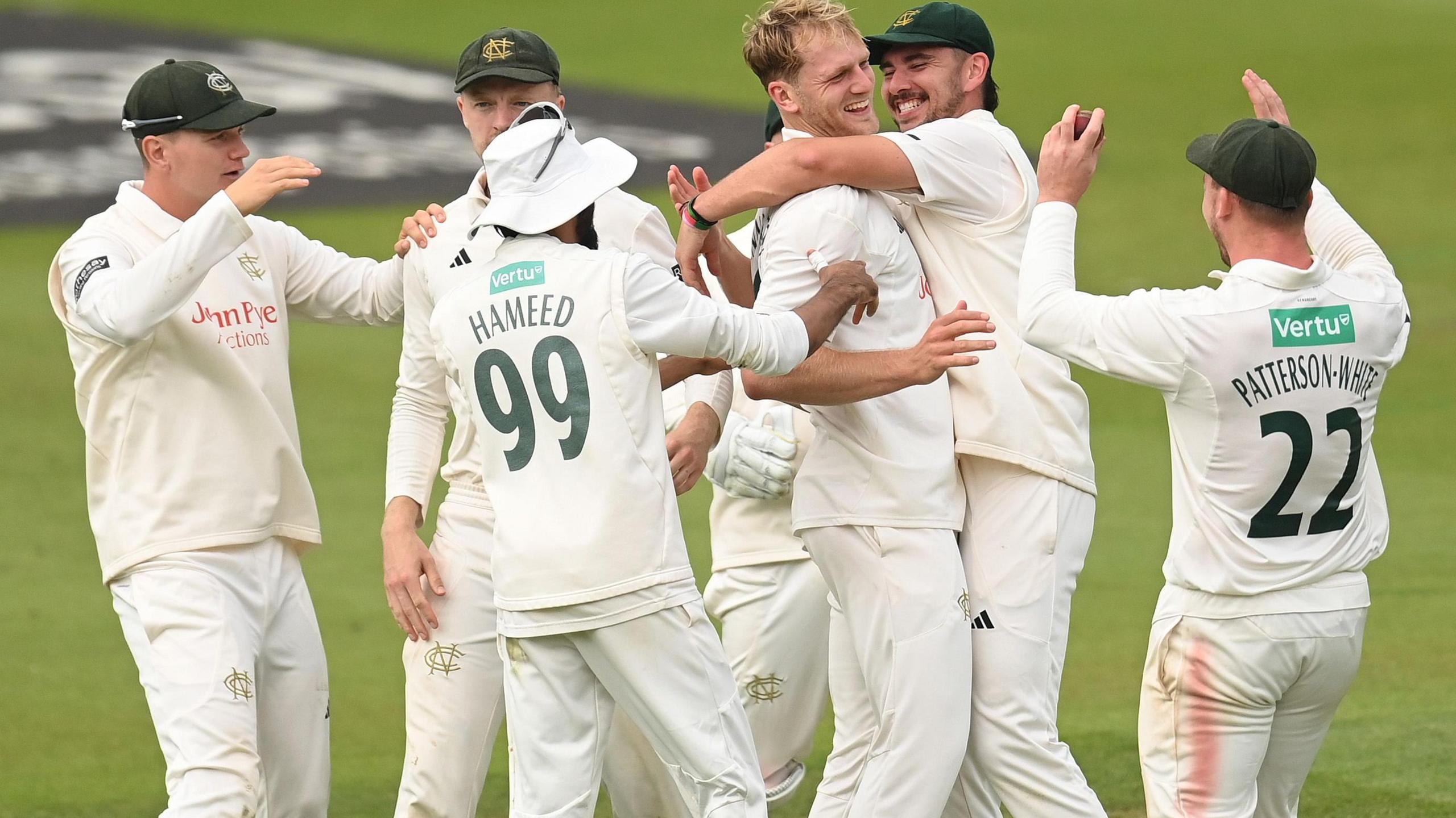 Notts players celebrate taking wicket