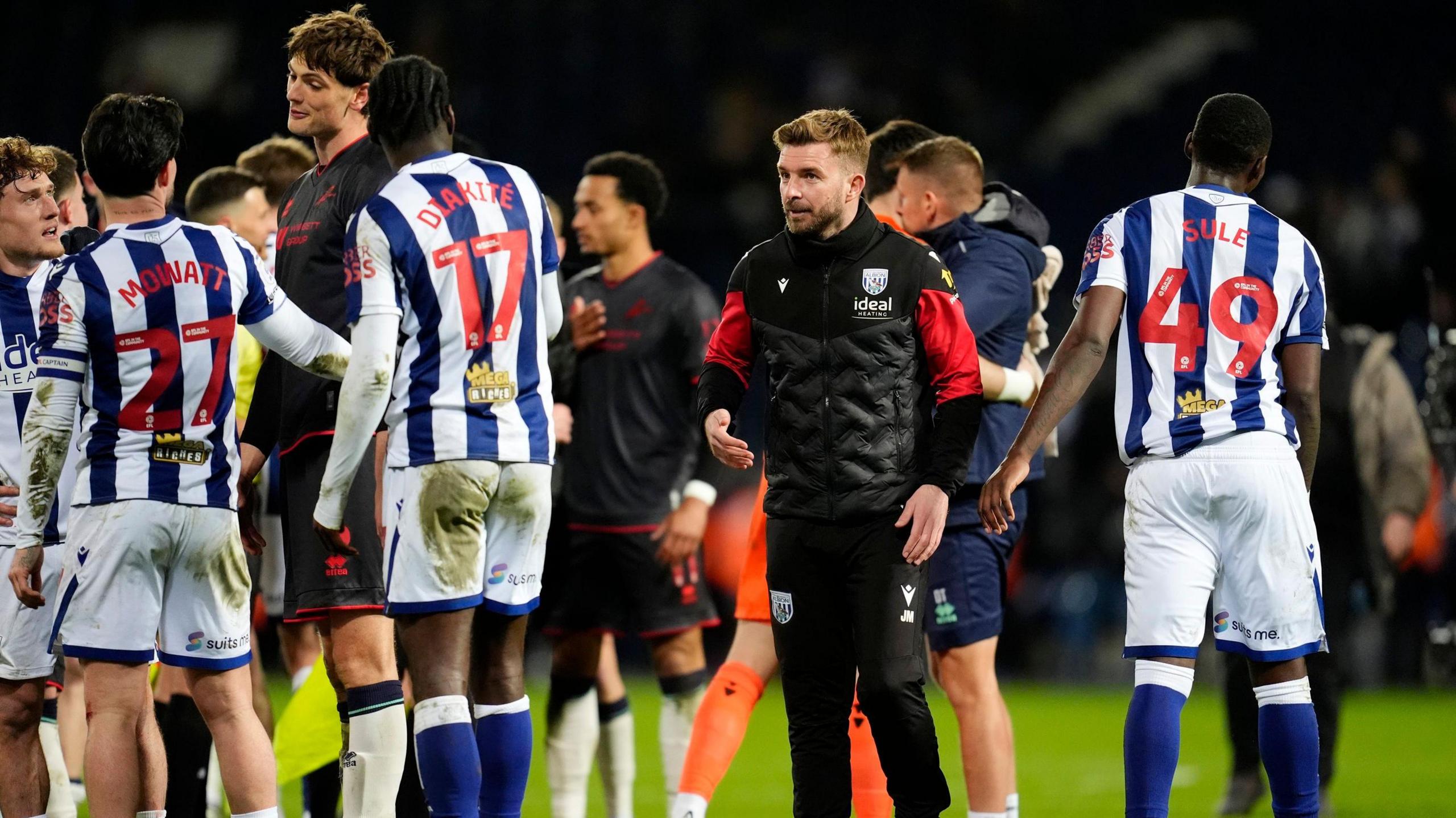 West Bromwich Albion and Millwall players shake hands after their match at The Hawthorns, with Baggies boss James Morrison in the middle of the group