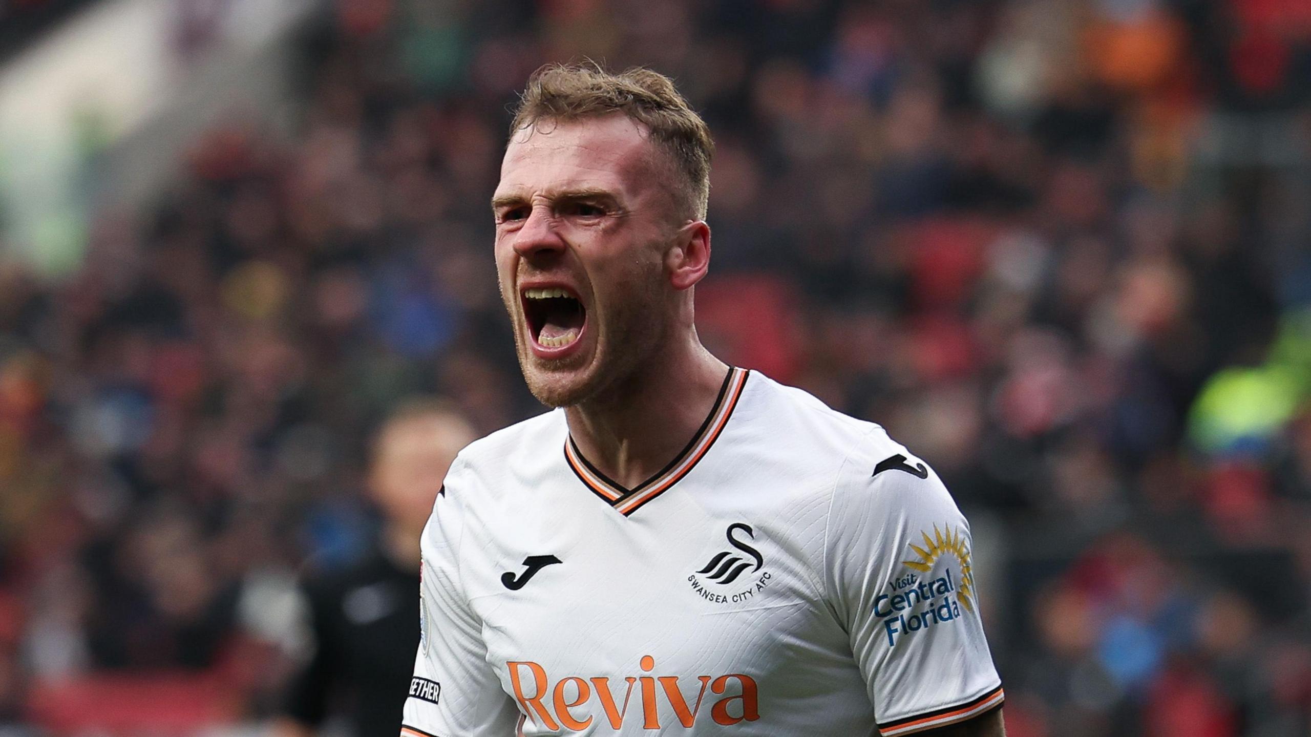 Josh Tymon celebrates his goal