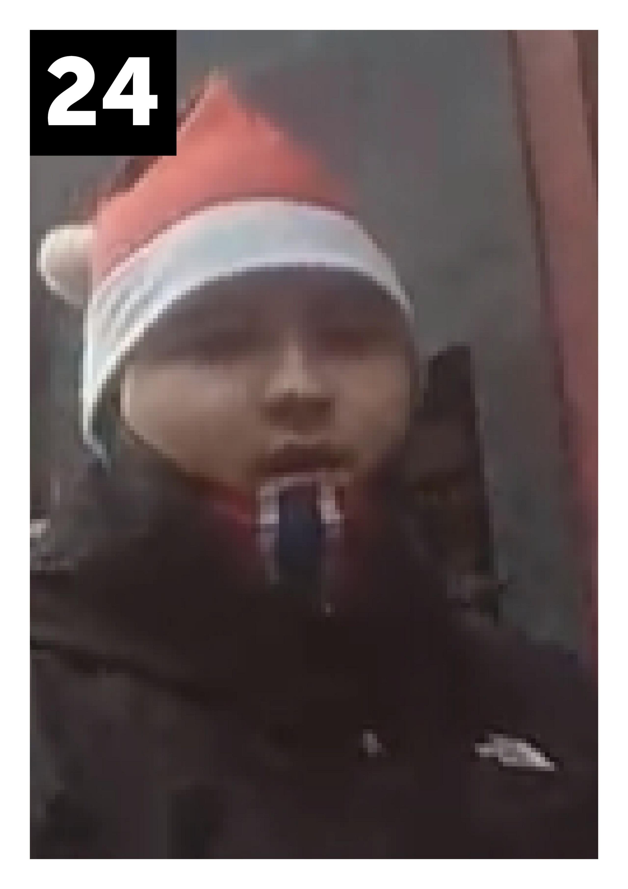 Young man in black jacket and santa hat