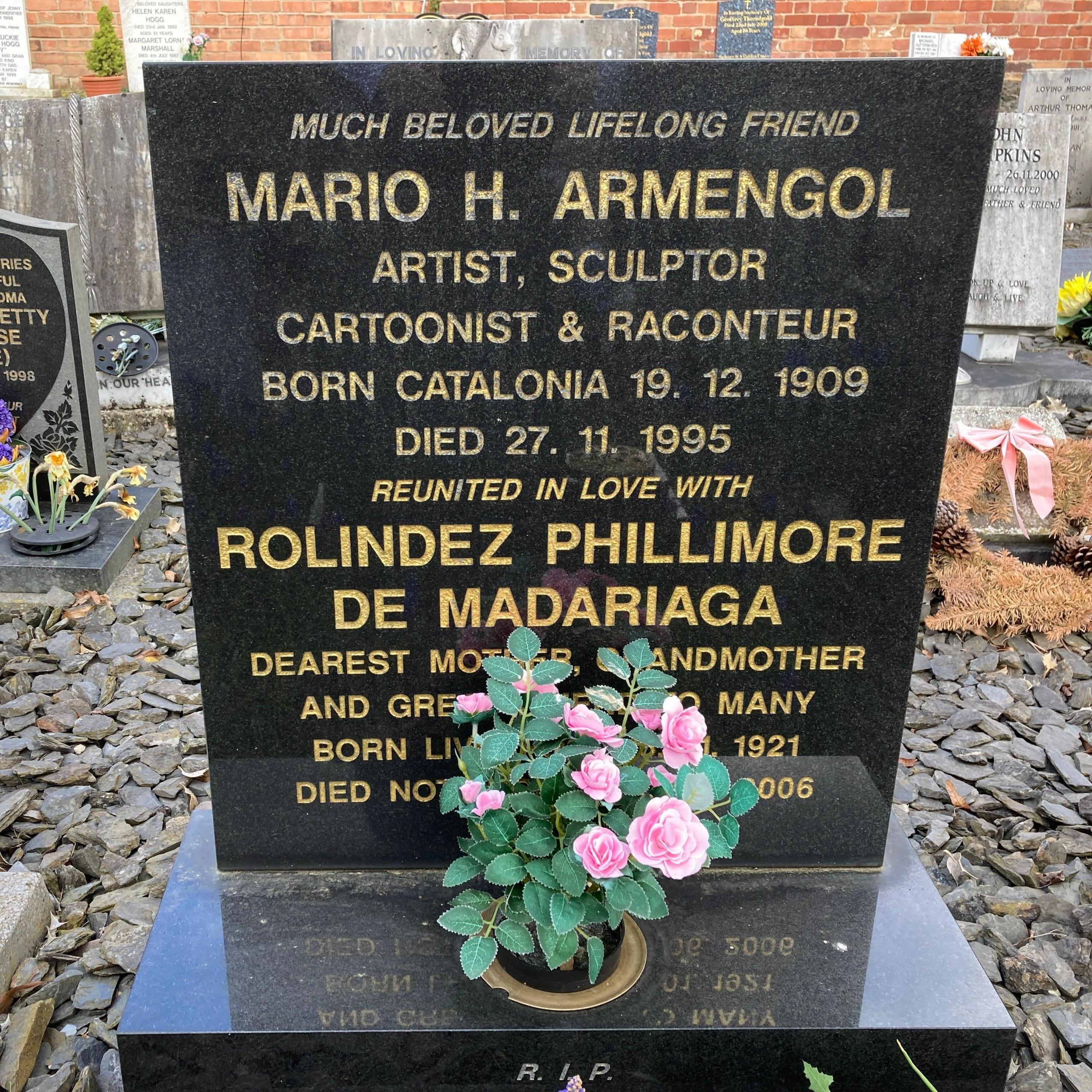 The picture shows the grave headstone, which is black with gold lettering. This is at Radcliffe-on-Trent cemetery. It says Mario Armengol, artist sculptor, cartoonist and raconteur. His partner Rolindez De Madariaga is buried in the same plot.