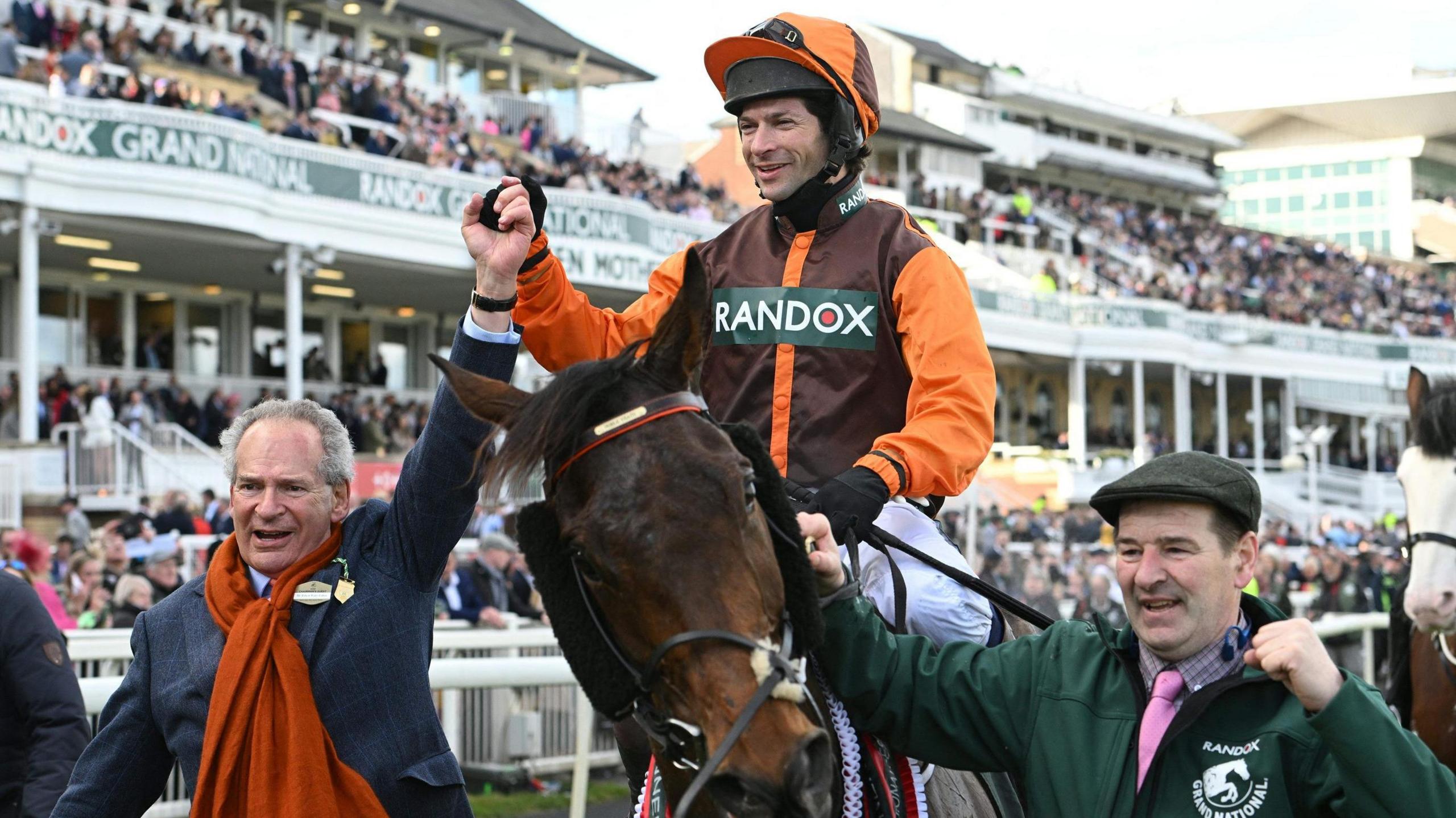 Sam Waley-Cohen and father Robert celebrate Noble Yeats winning the 2022 Grand National