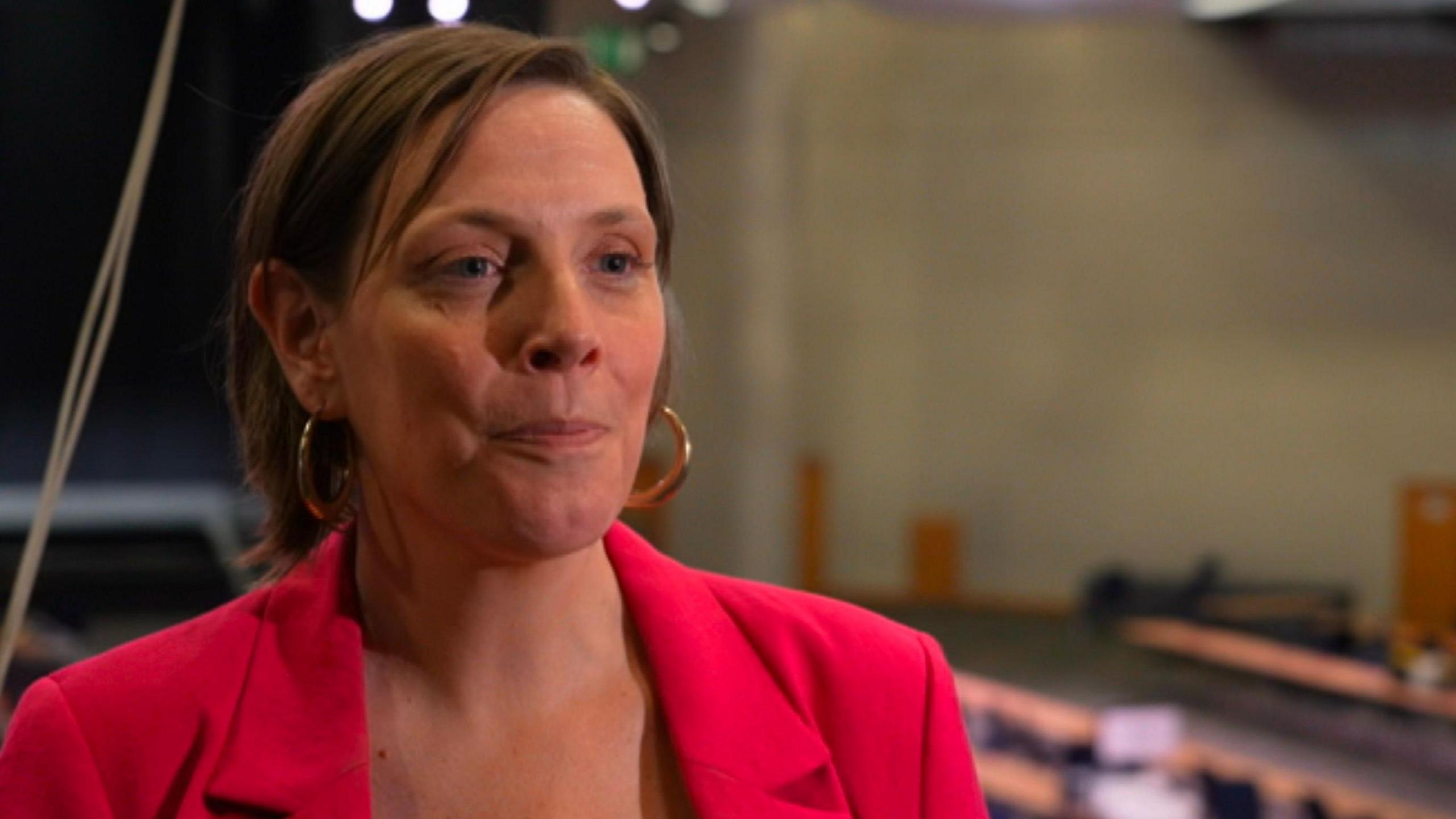 Jess Phillips pictured in a red jacket at her election count