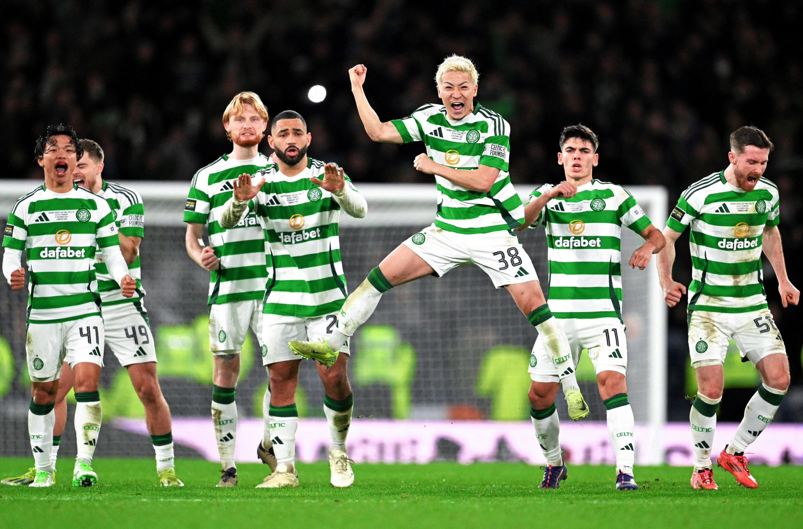 Daizen Maeda of Celtic celebrates in the penalty shoot out during the Premier Sports Cup Final between Celtic and Rangers at Hampden Park