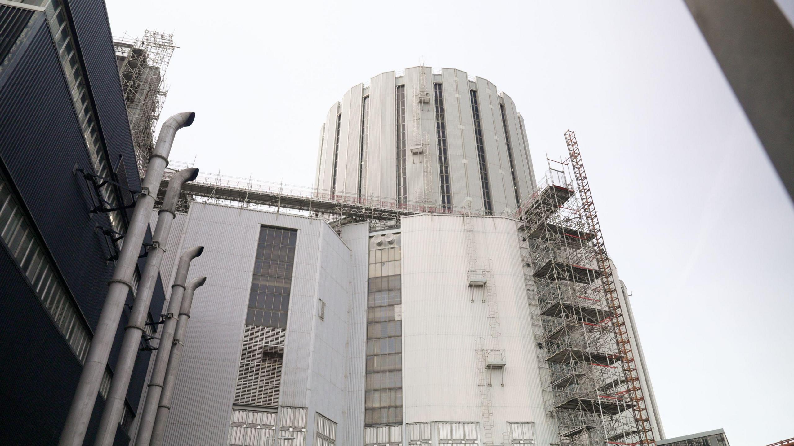 A view from the ground looking up at the tower of the Dungeness B nuclear power station