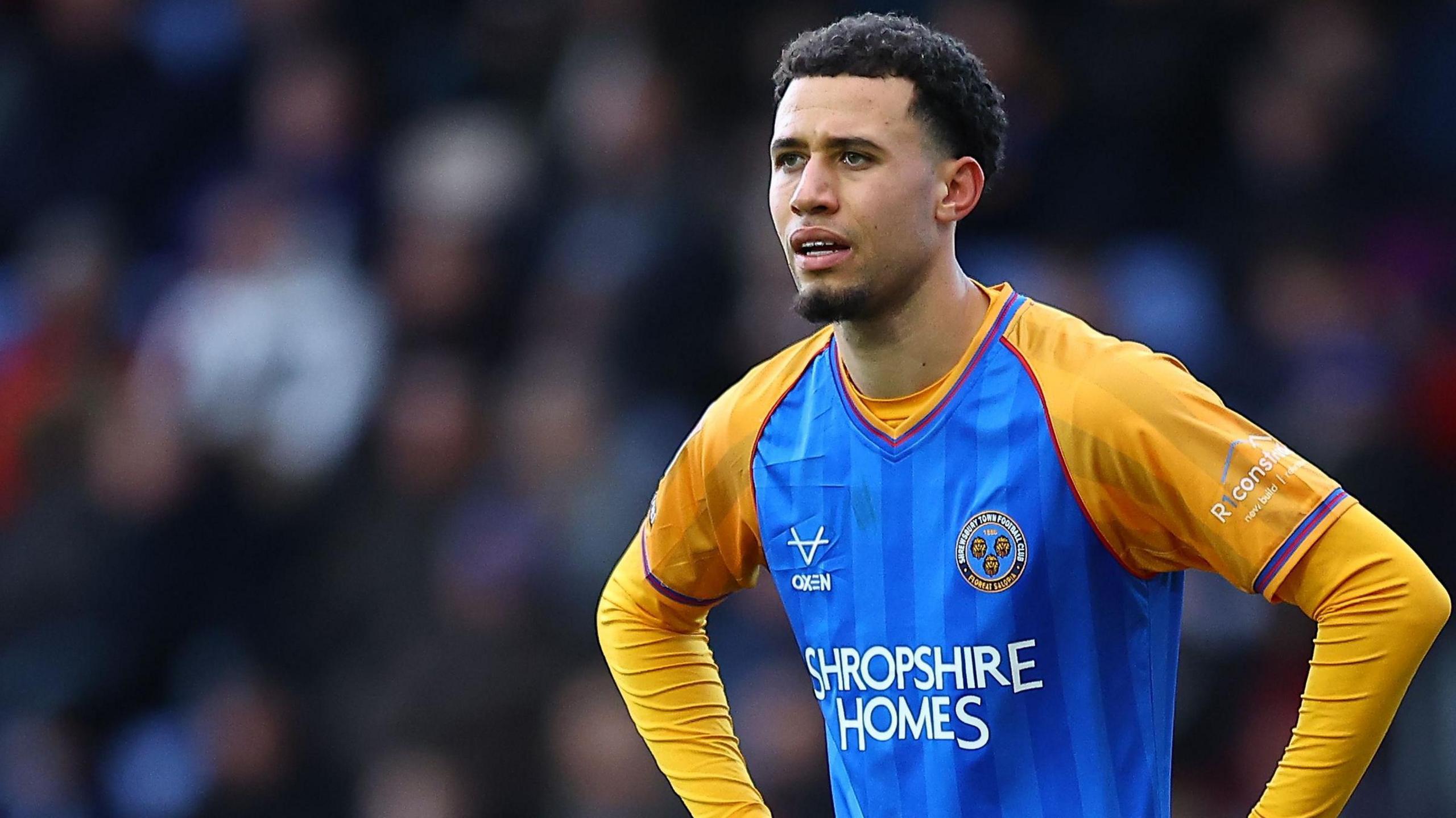 Shrewsbury Town defender Luca Hoole in action 