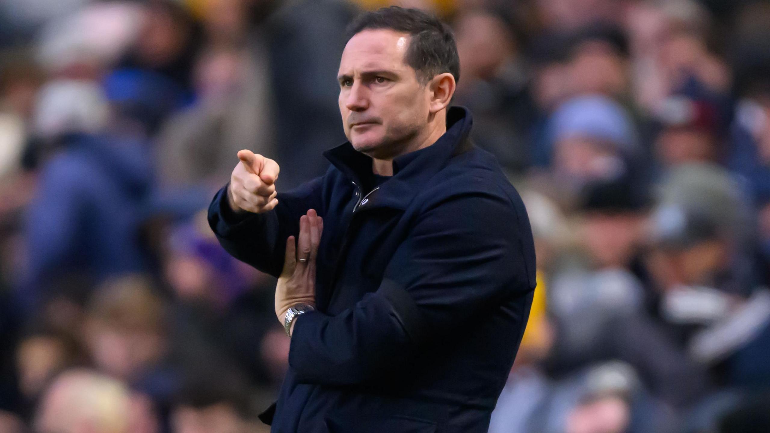 New Coventry City head coach Frank Lampard directs the on-field traffic in Saturday's 1-0 win at Millwall