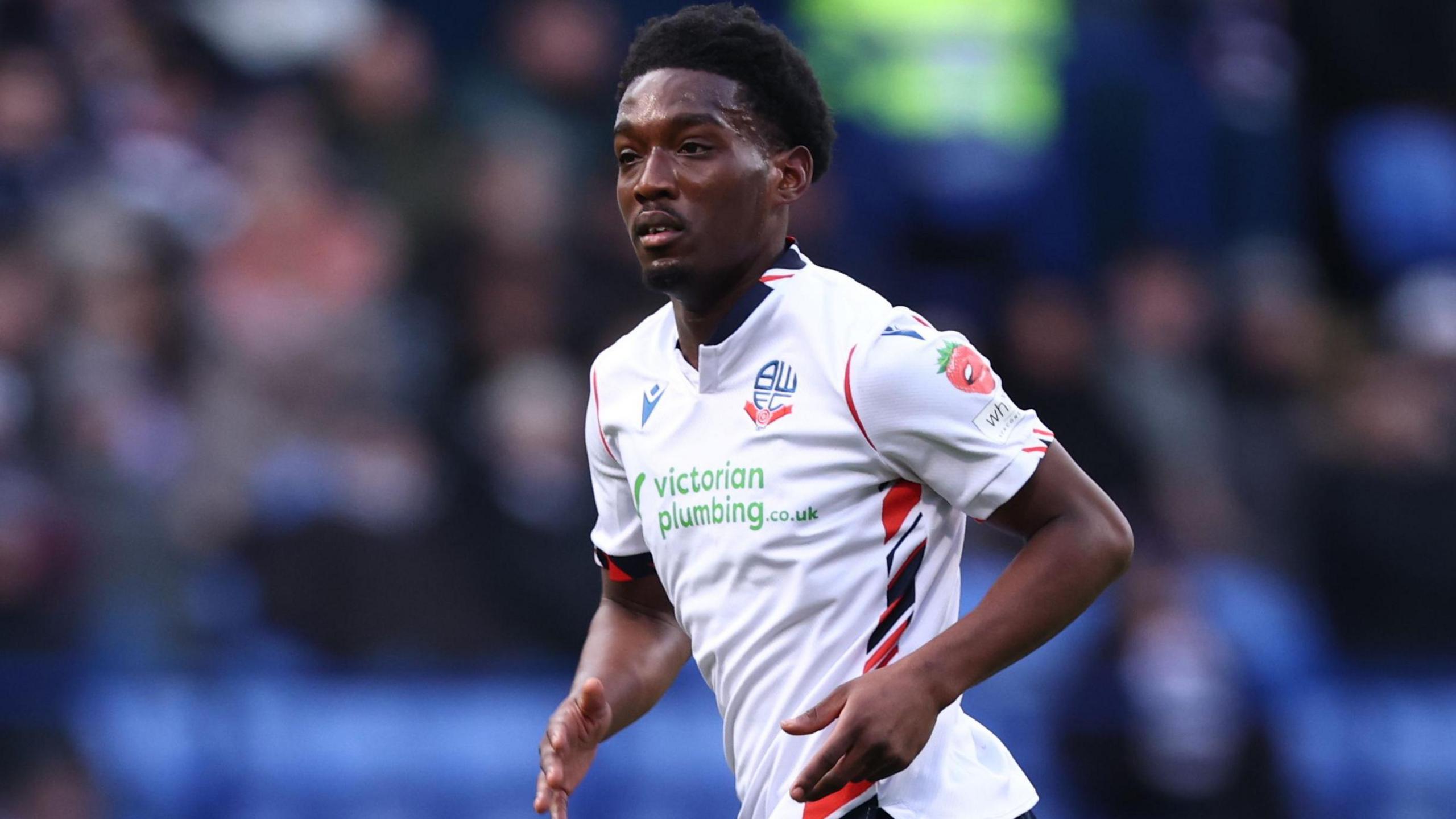 Amario Cozier-Duberry running during Bolton's game with Leyton Orient