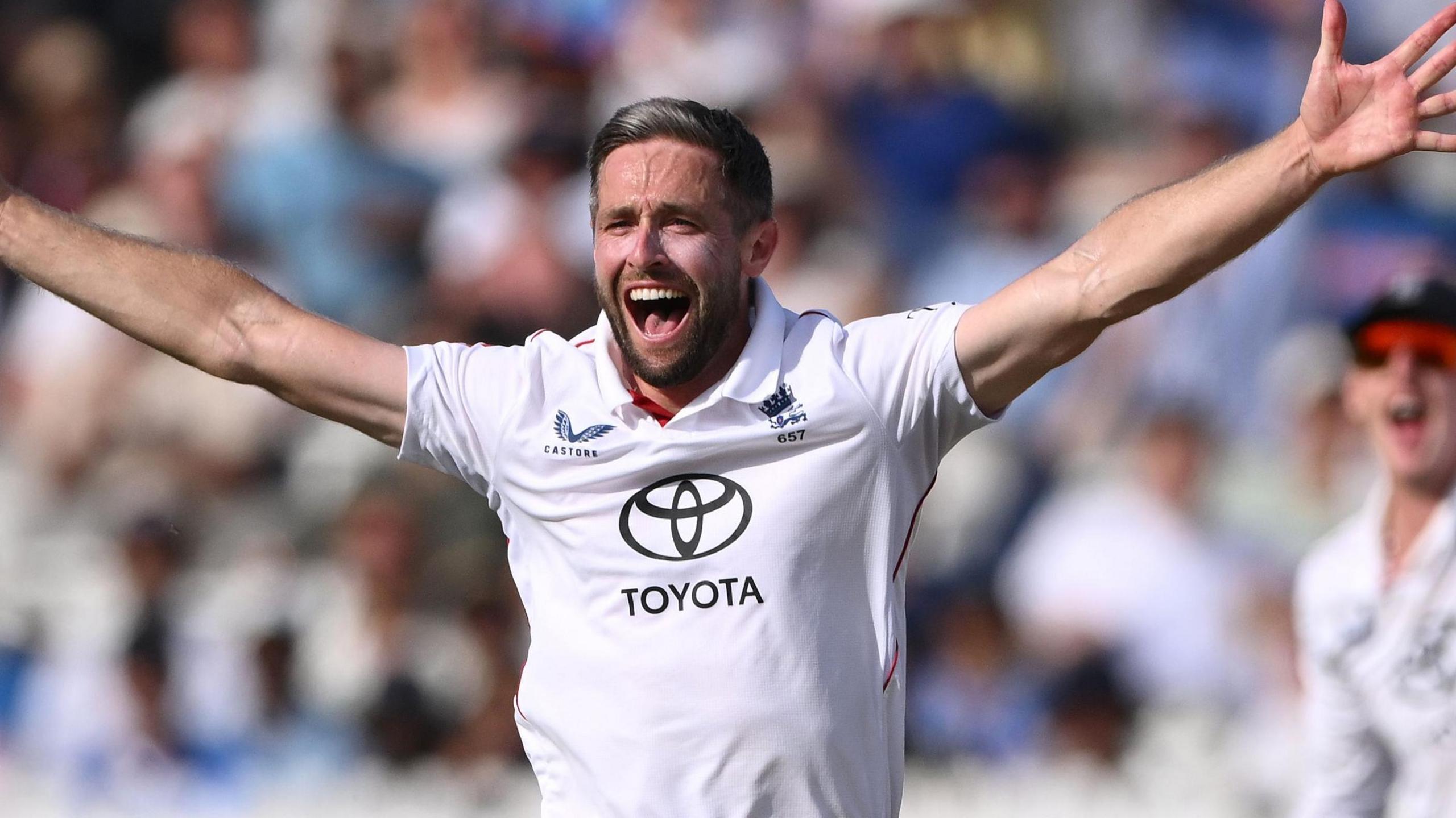 Chris Woakes appeals for a wicket while playing for England