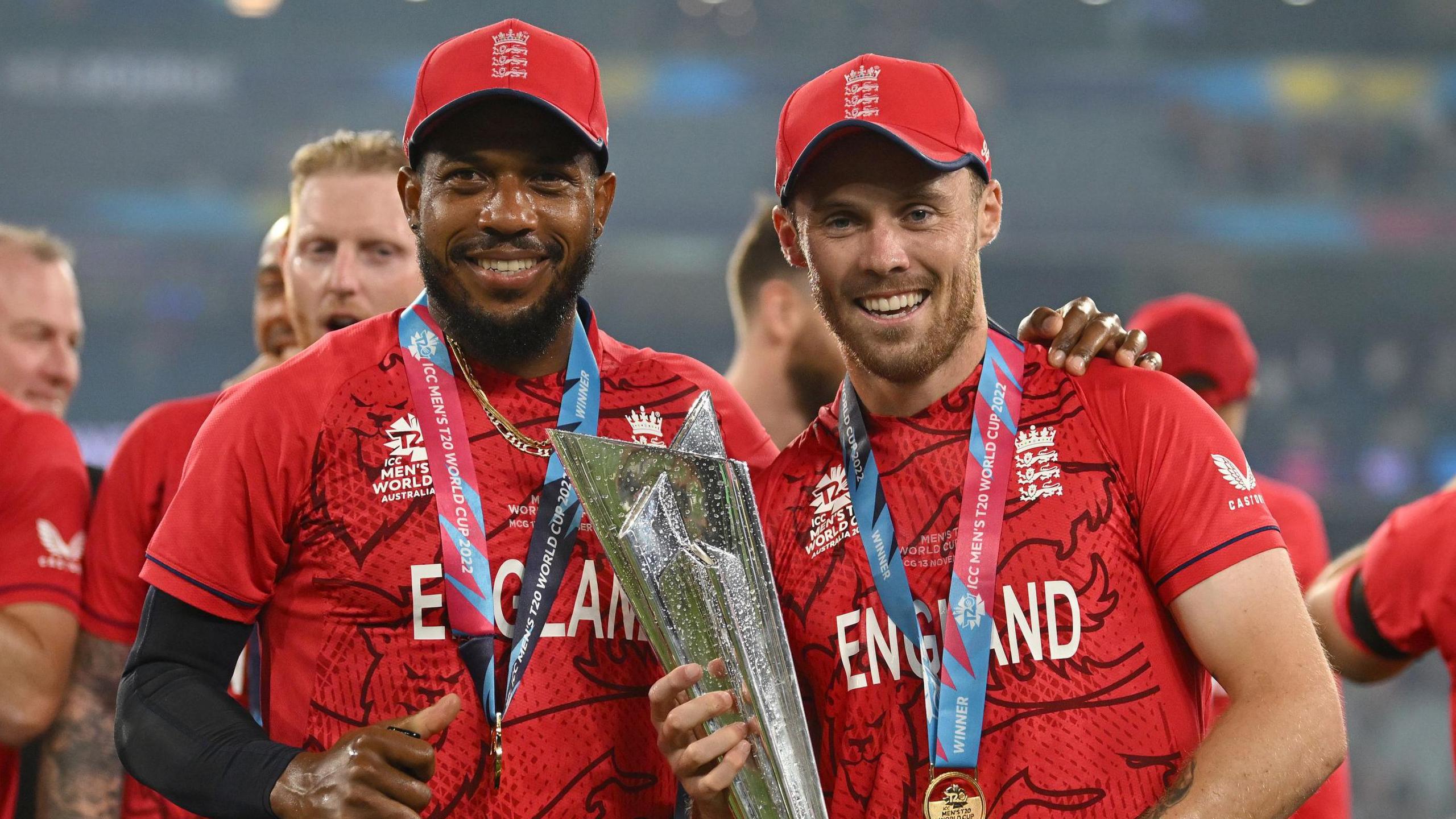 Chris Jordan and Phil Salt celebrate with World Cup trophy