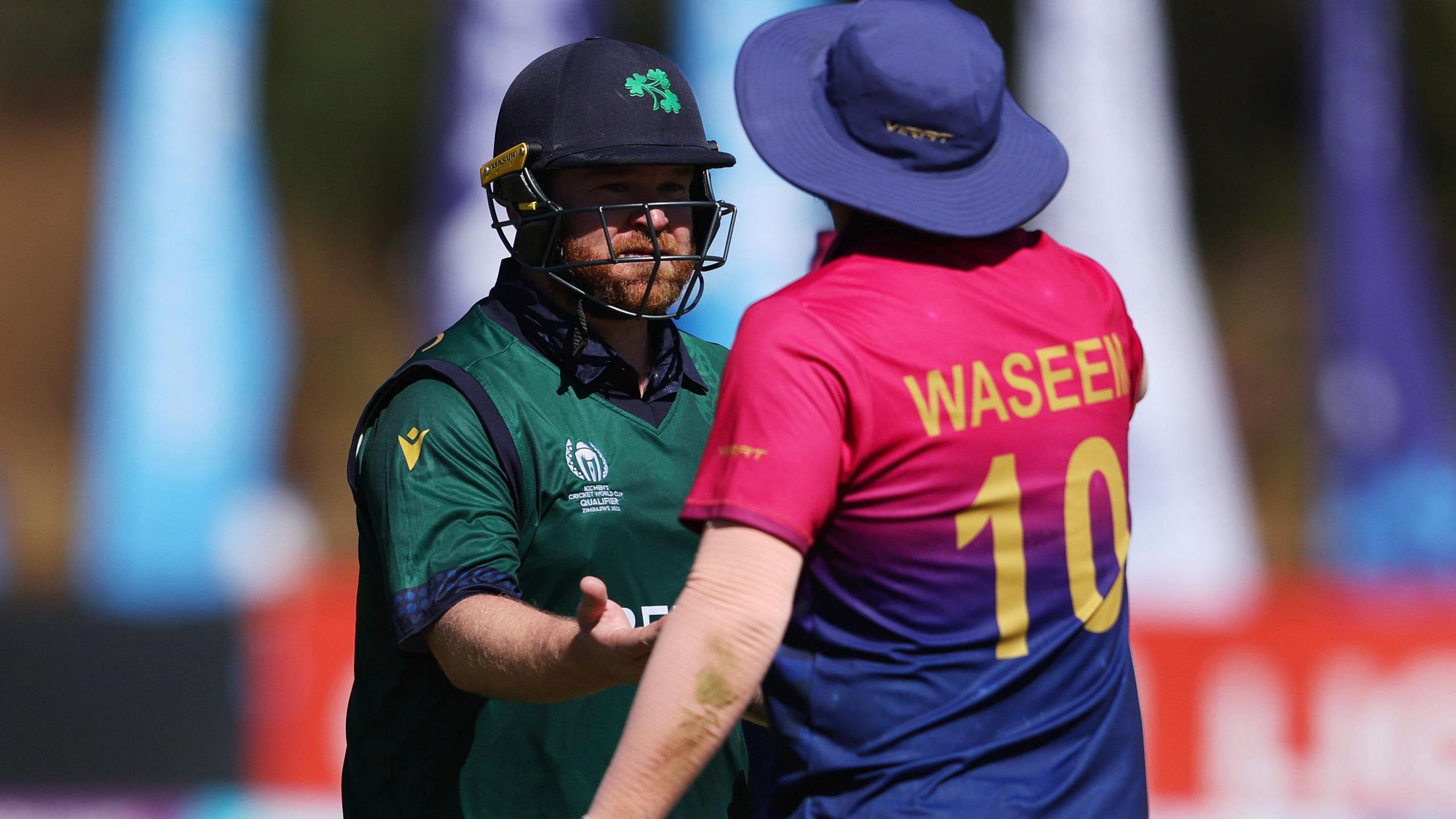 Ireland captain Paul Stirling and United Arab Emirates player Mohammad Waseem during a match in 2023