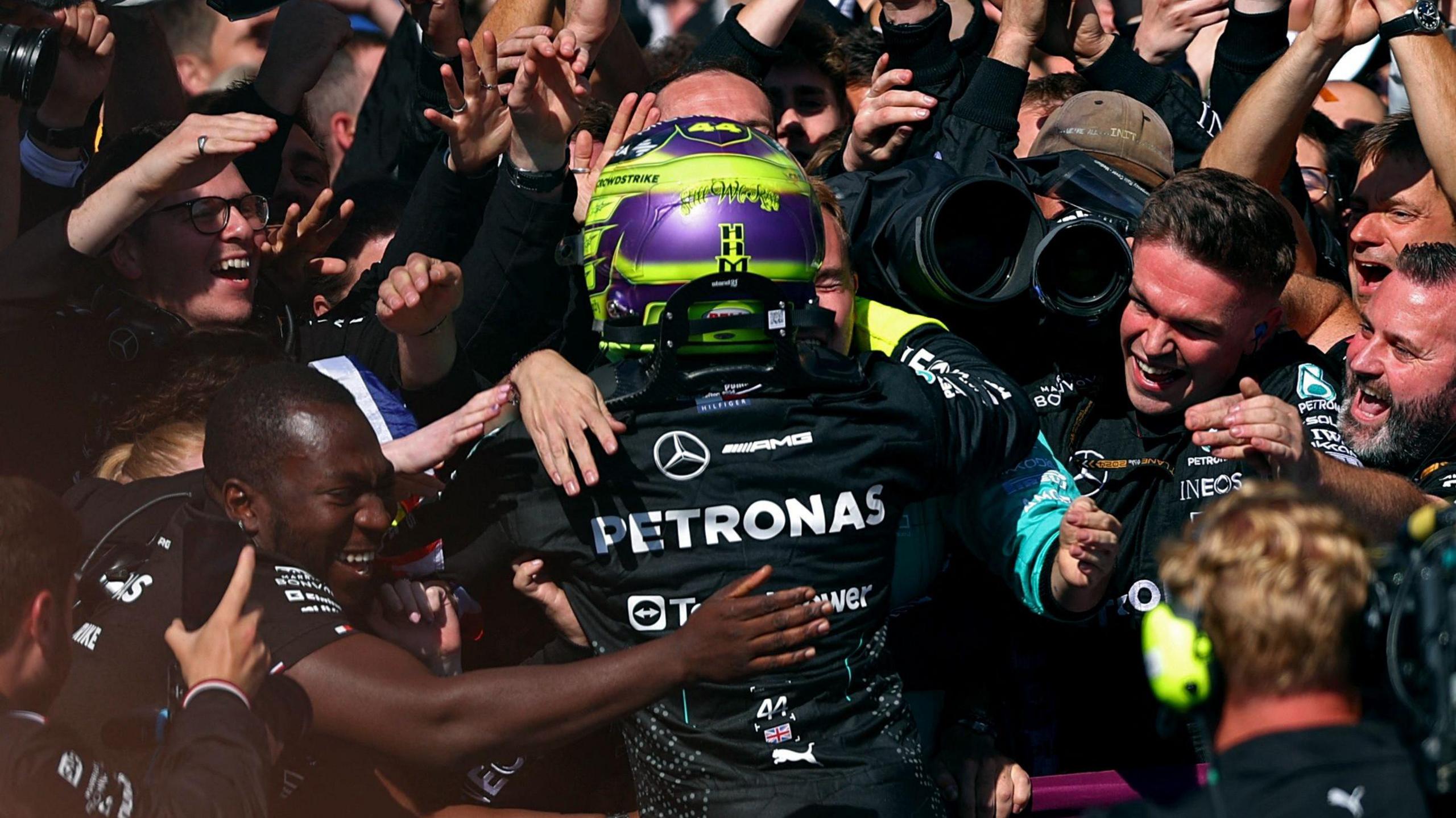 lewis hamilton celebrates with Mercedes